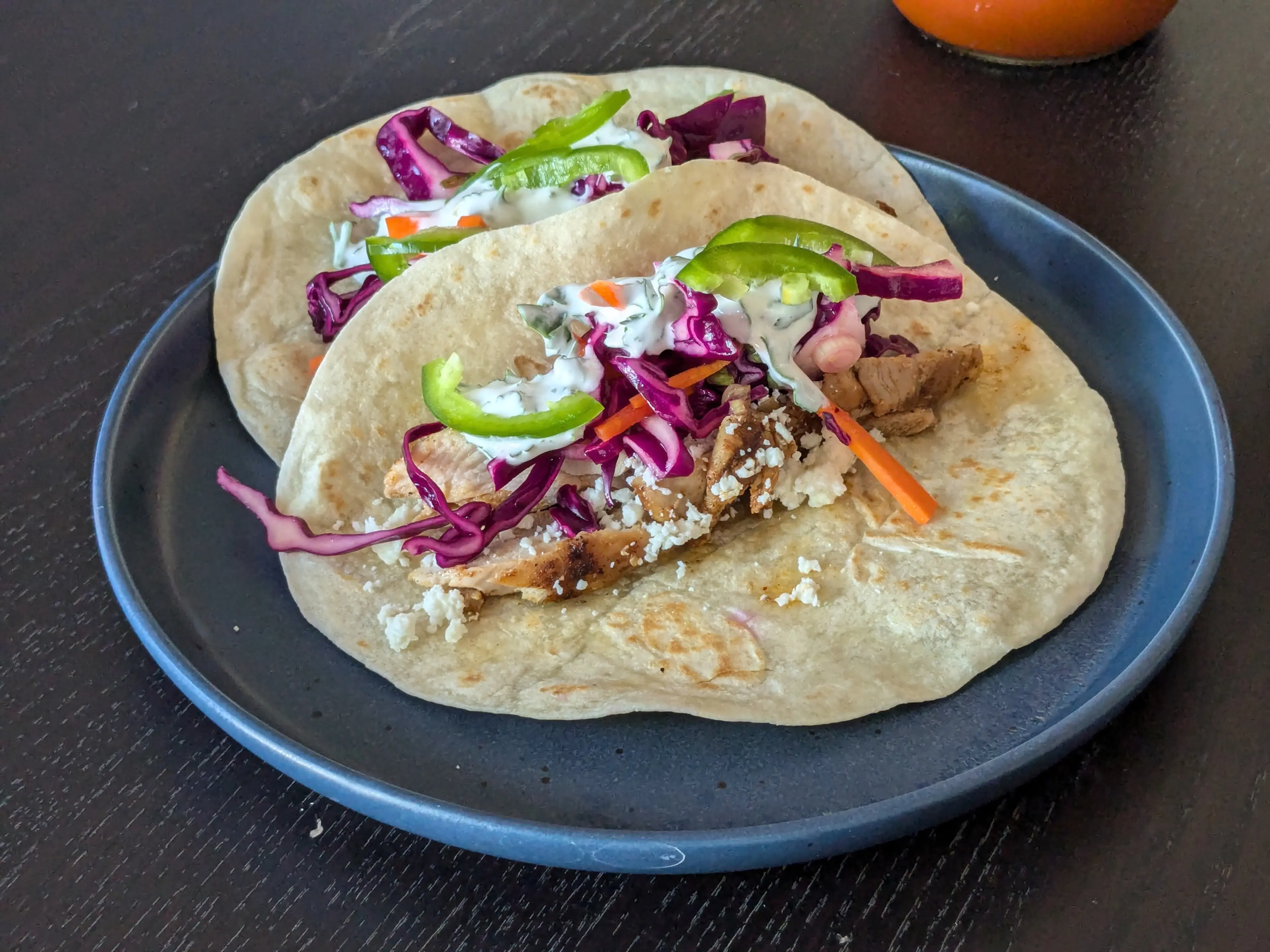 Grilled Chicken Tacos with Slaw & Lime Crema