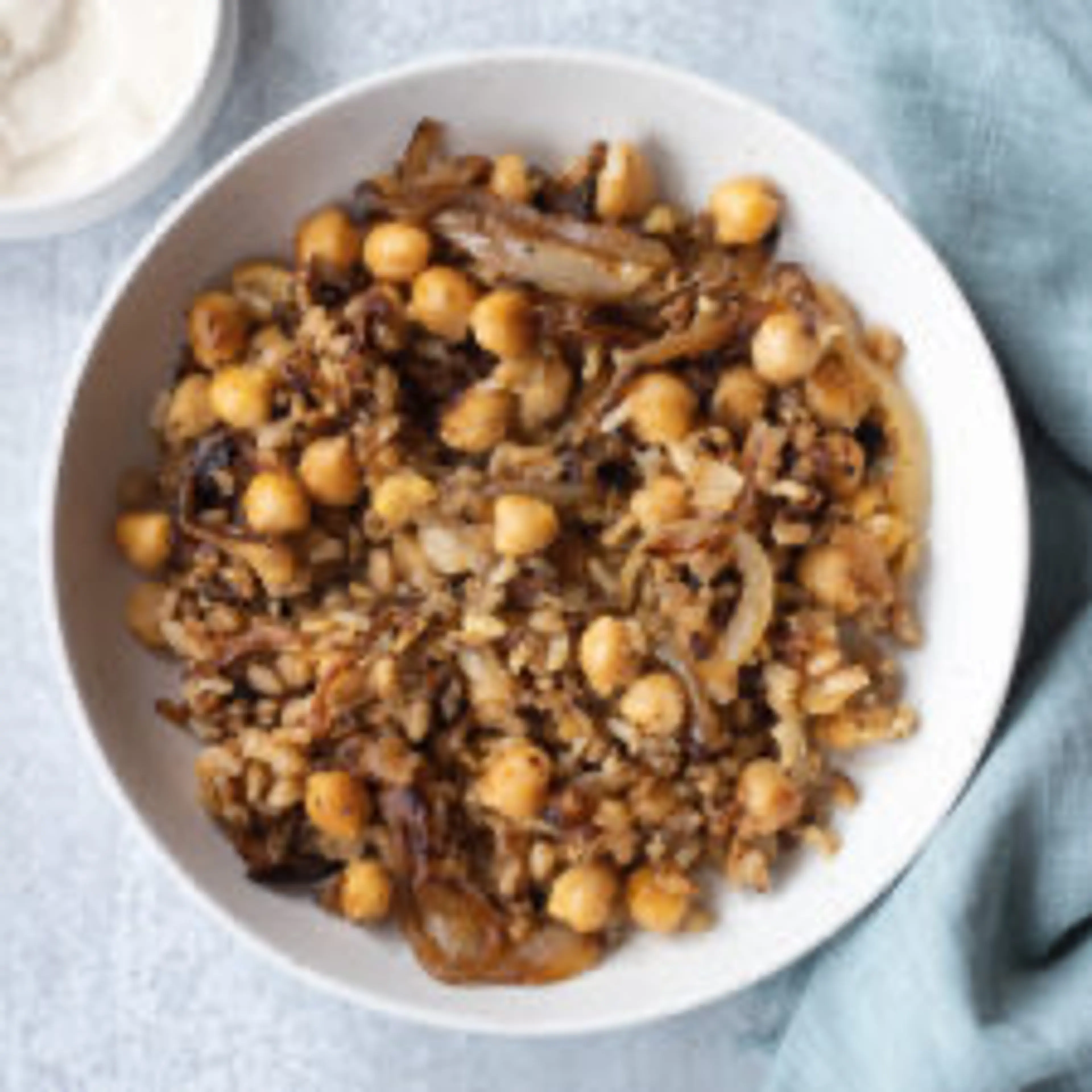 Crispy grains and chickpeas with garlic tahini yogurt