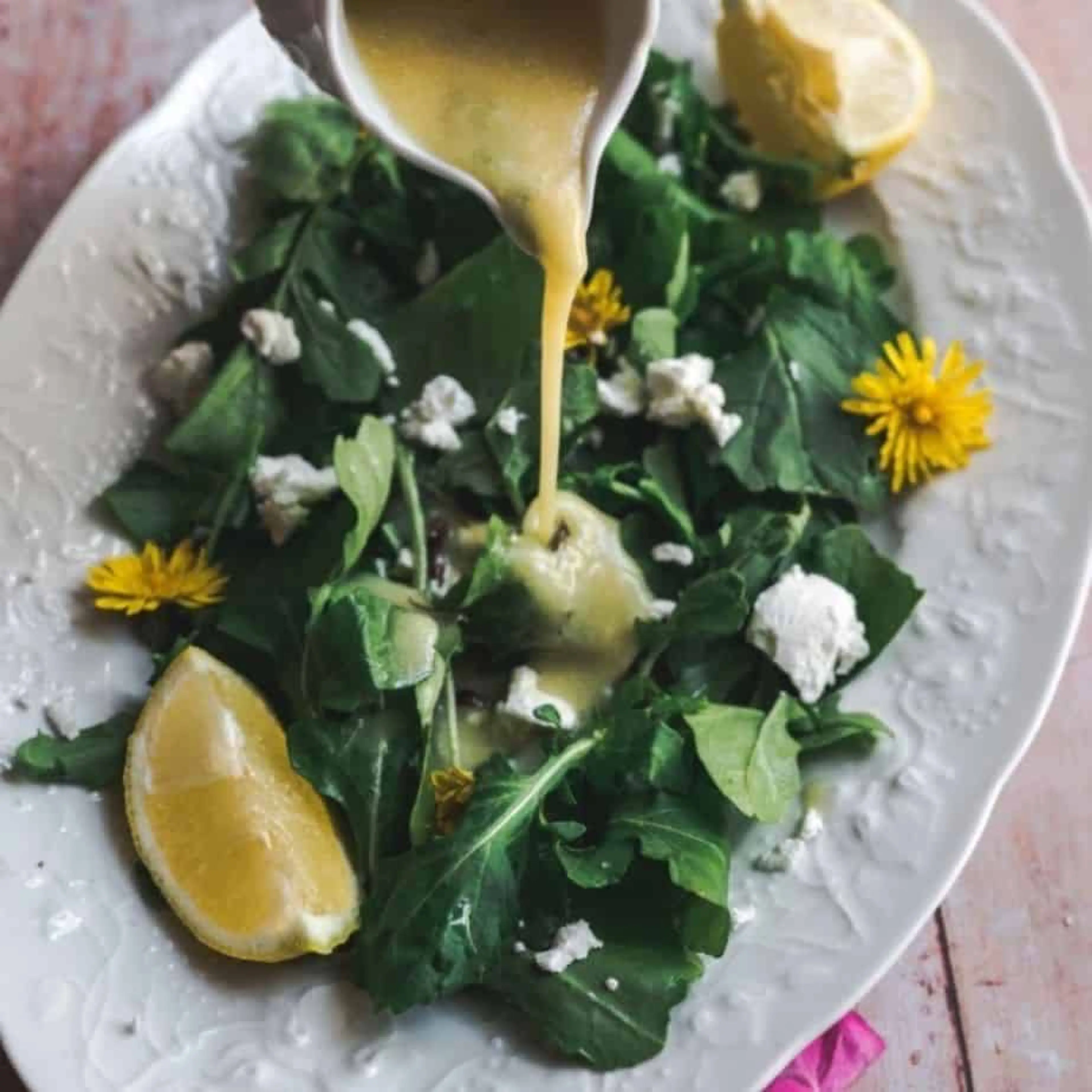Arugula and dandelion greens salad with dandelion root lemon