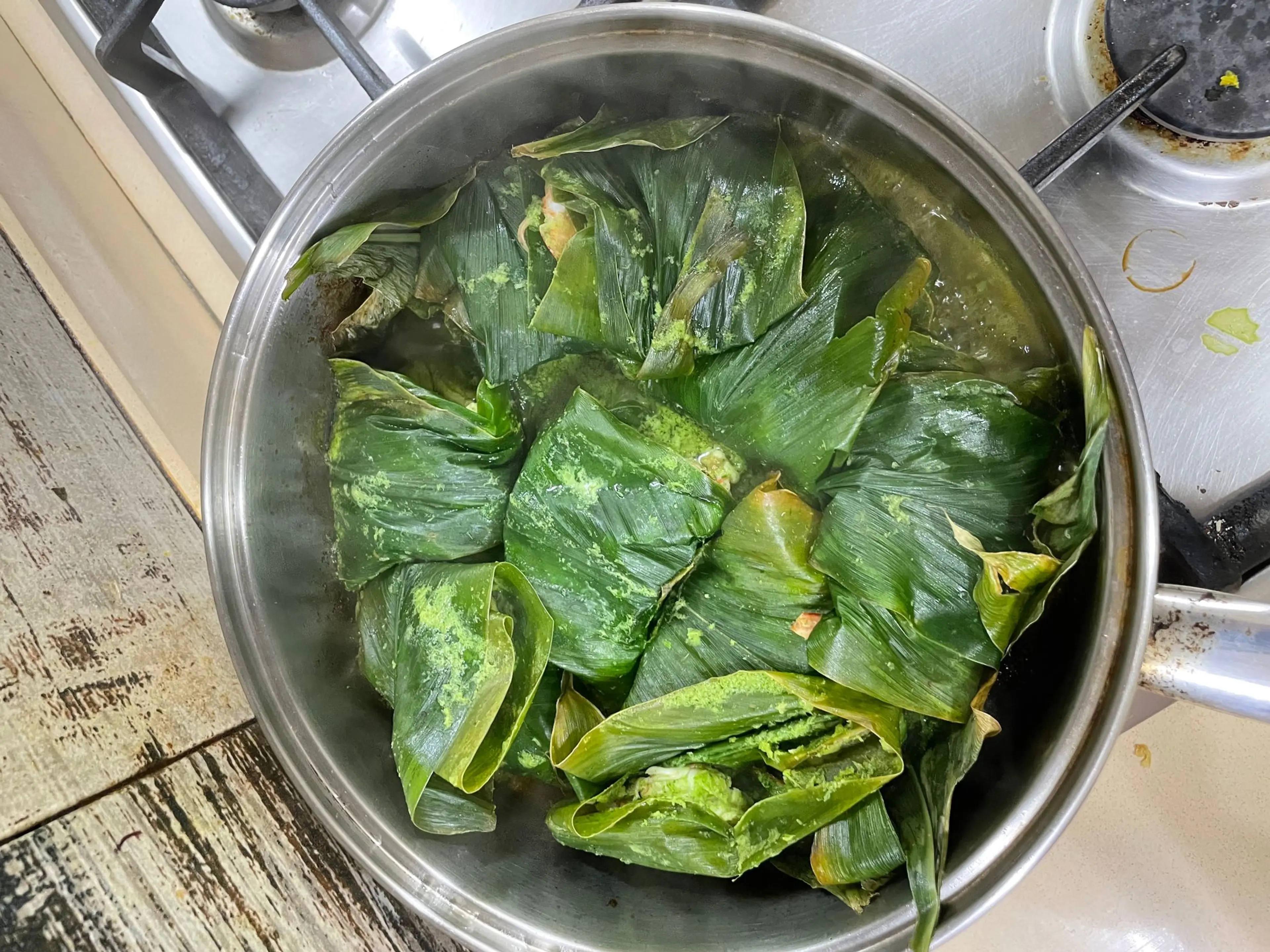 Green Masala Prawns in Tumeric Leaves