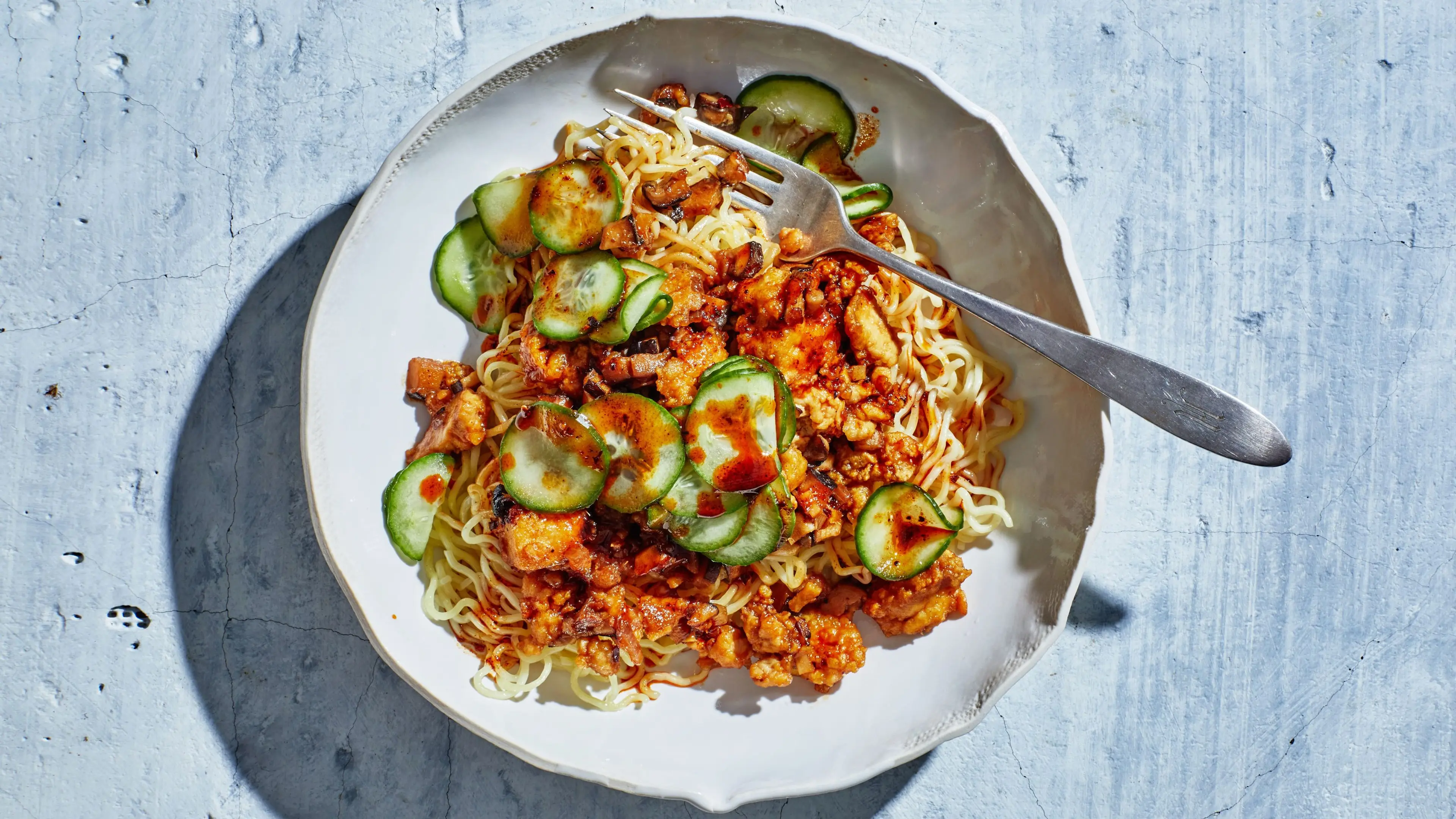 Saucy Tofu Noodles With Cucumbers and Chili Crisp