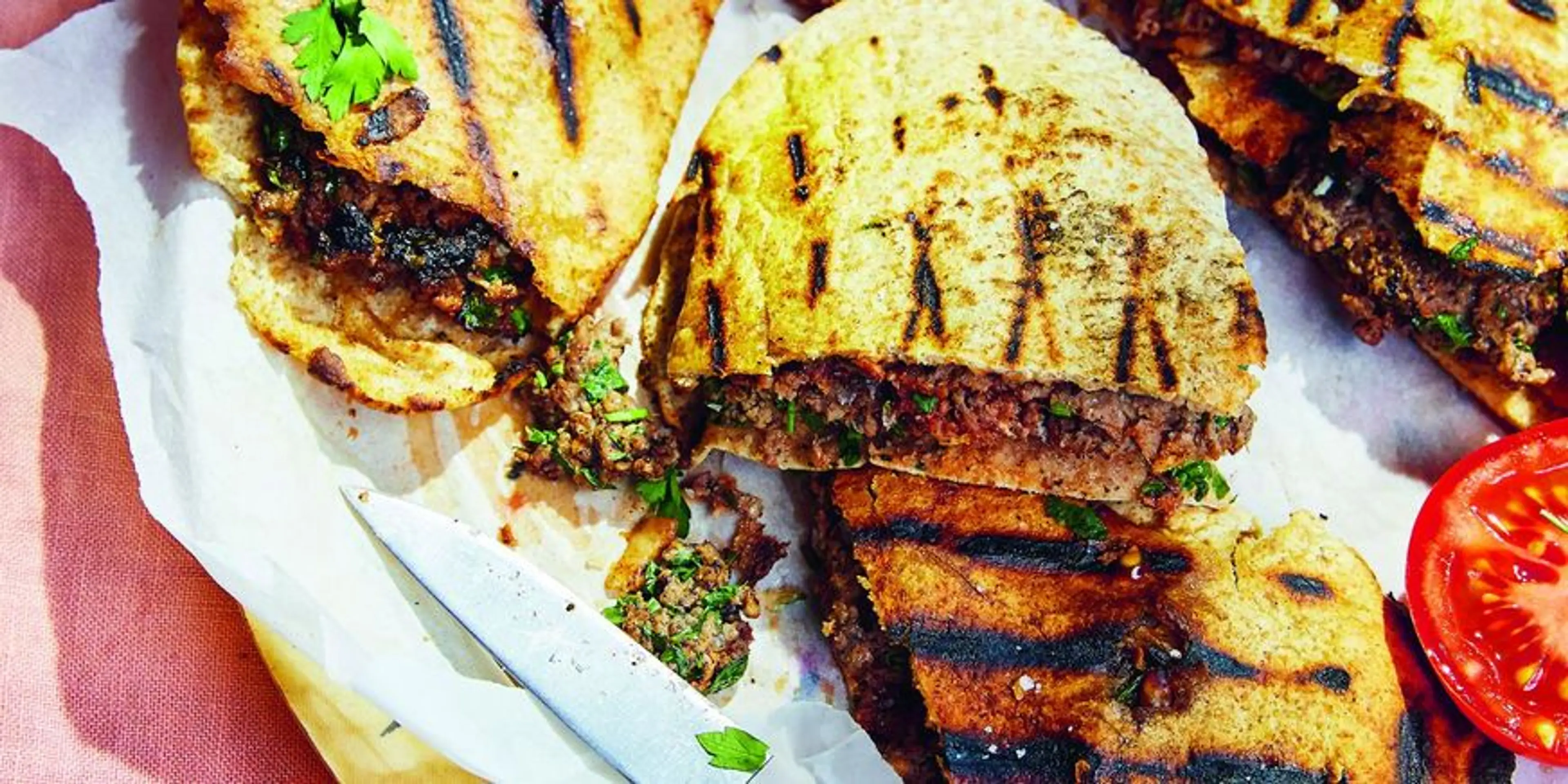 Grilled pitta stuffed with sumac-spiced meat