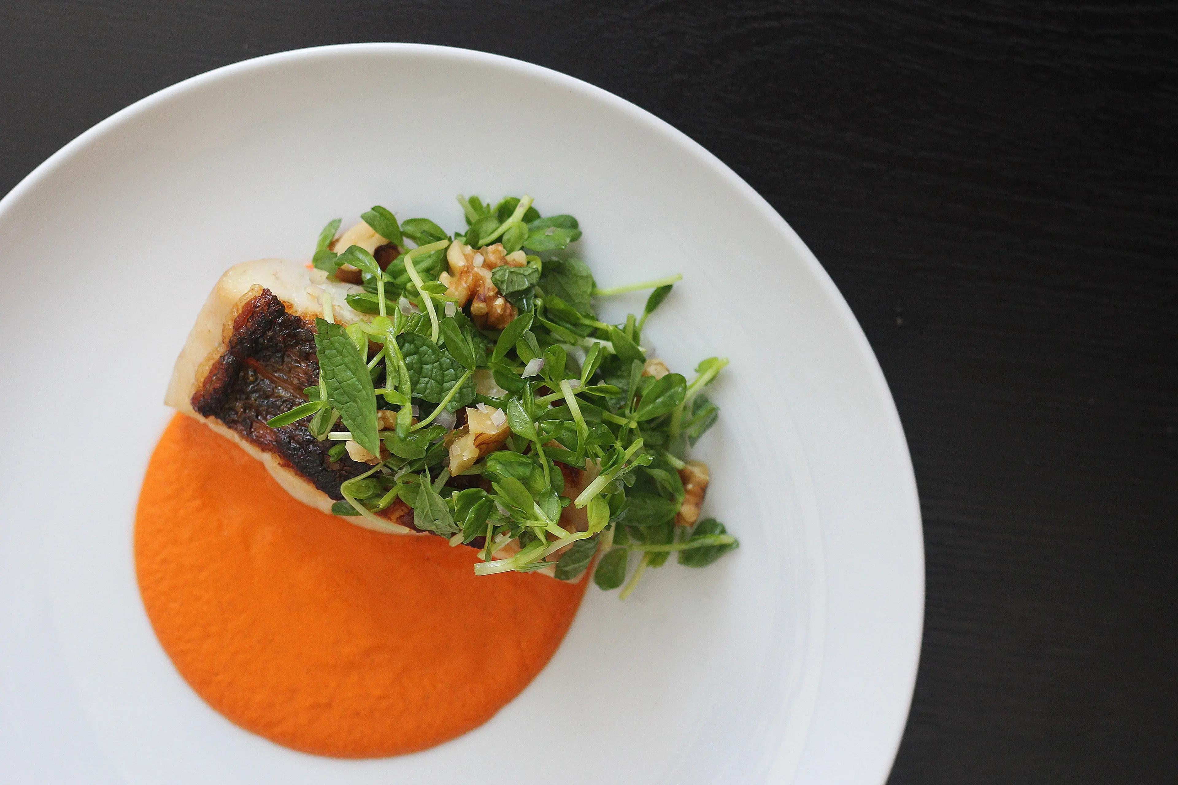 Crispy Pan Seared White Fish with Walnut Romesco and Pea Sho