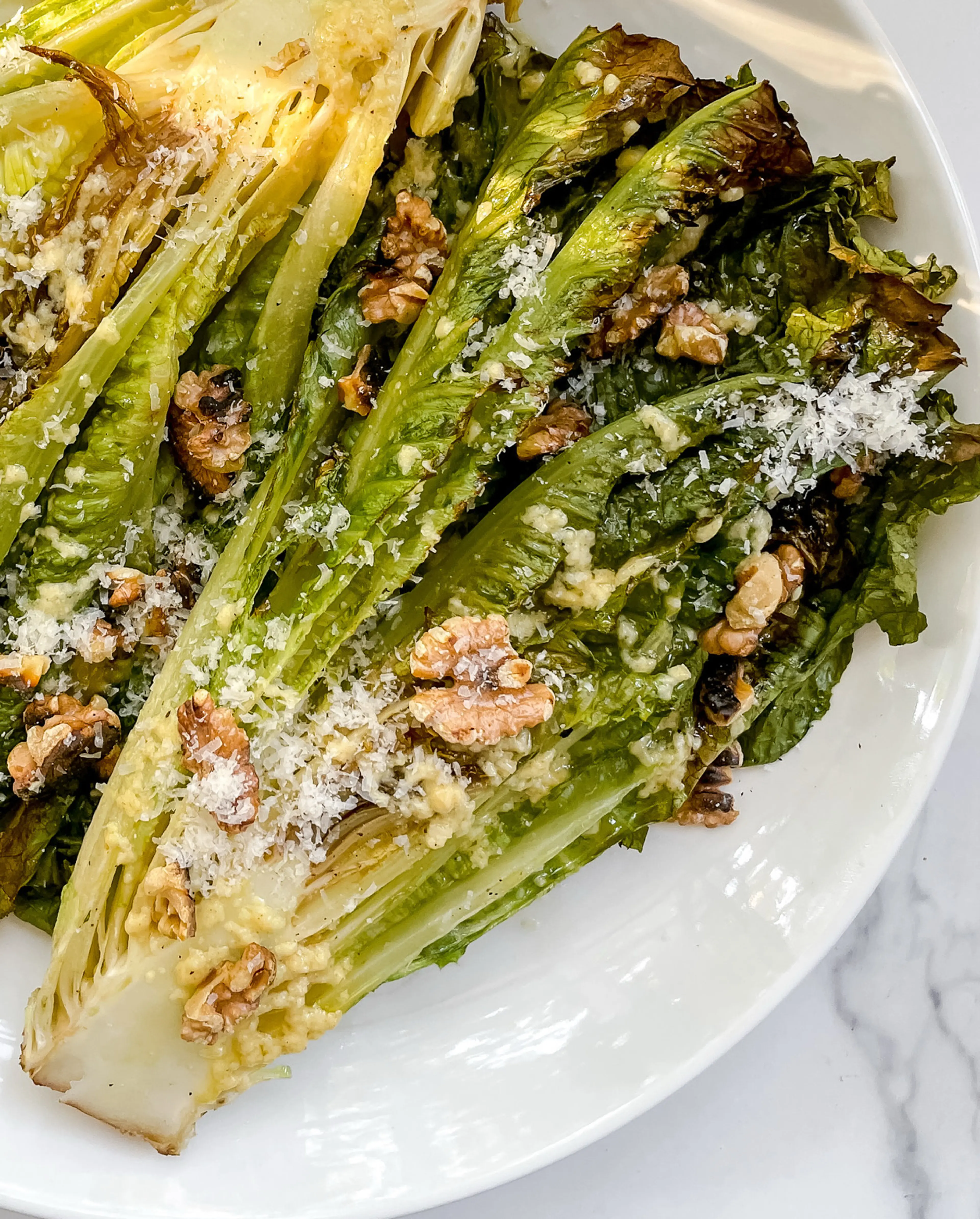 Charred Romaine Salad With Walnuts + Lemon Parmesan Dressing