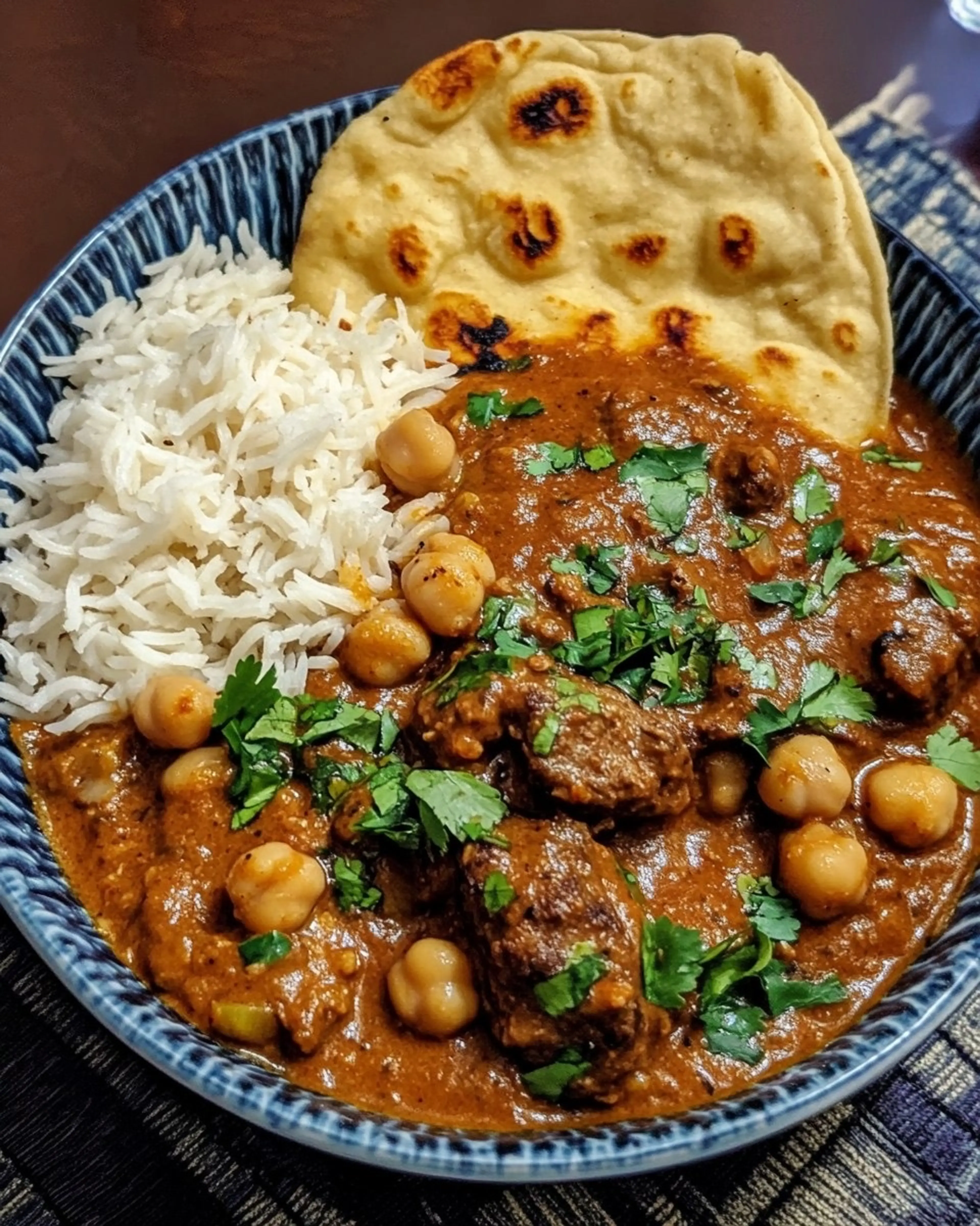 Creamy Coconut Beef & Chickpea Curry Served with Buttery Gar