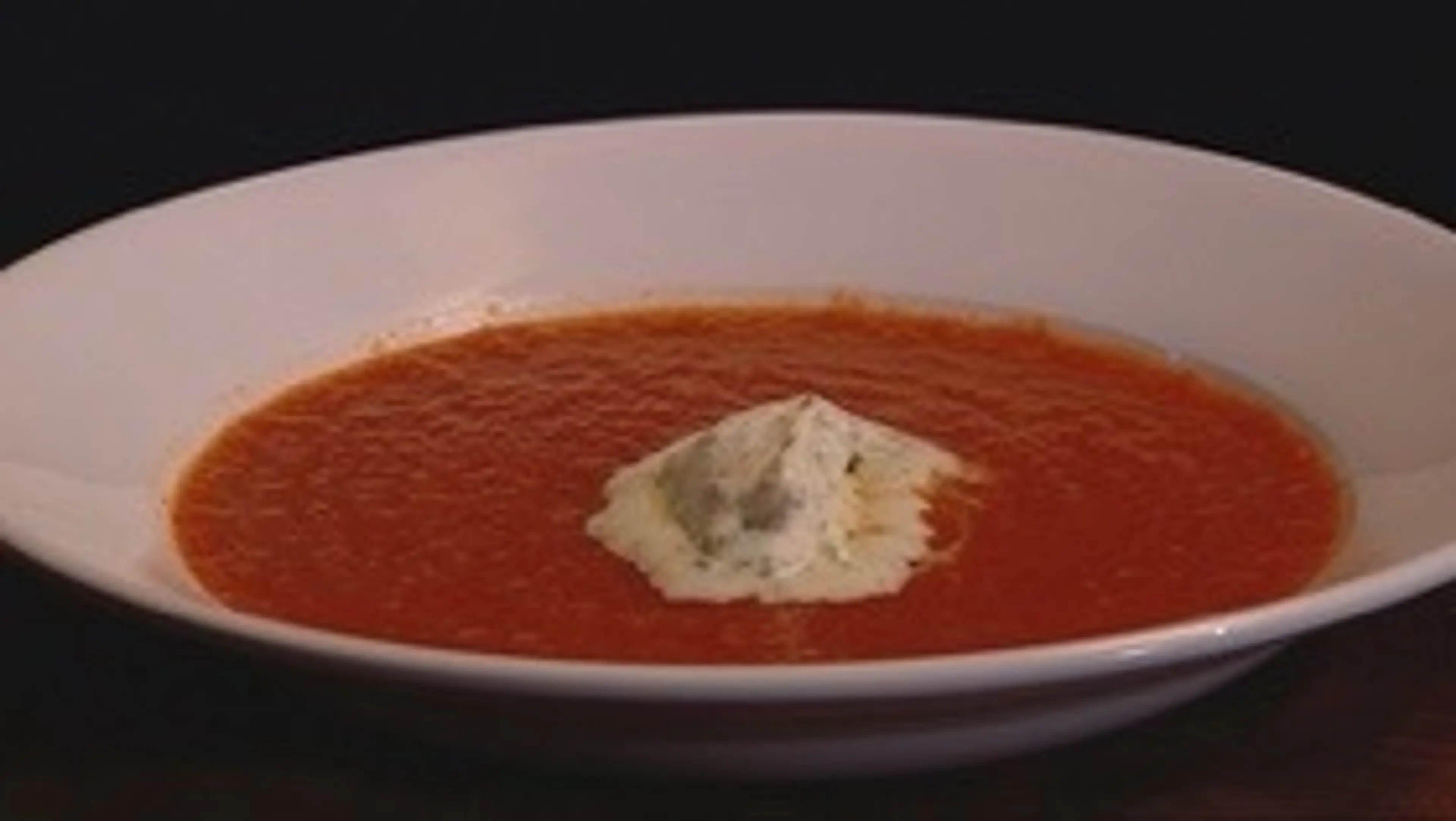 Tomato & harissa soup with coriander cream