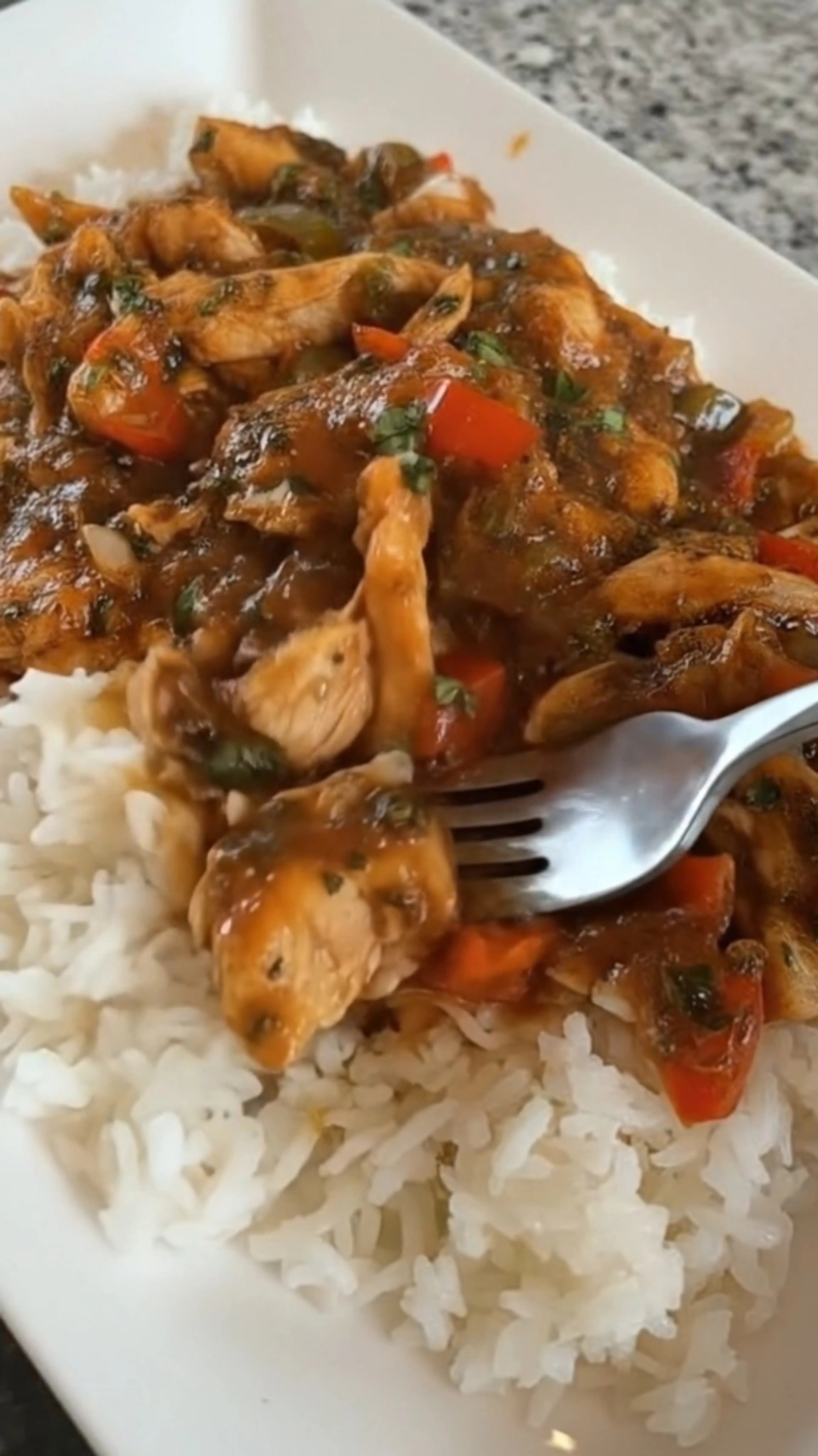 Spicy Pepper Chicken Over Steamed Rice
