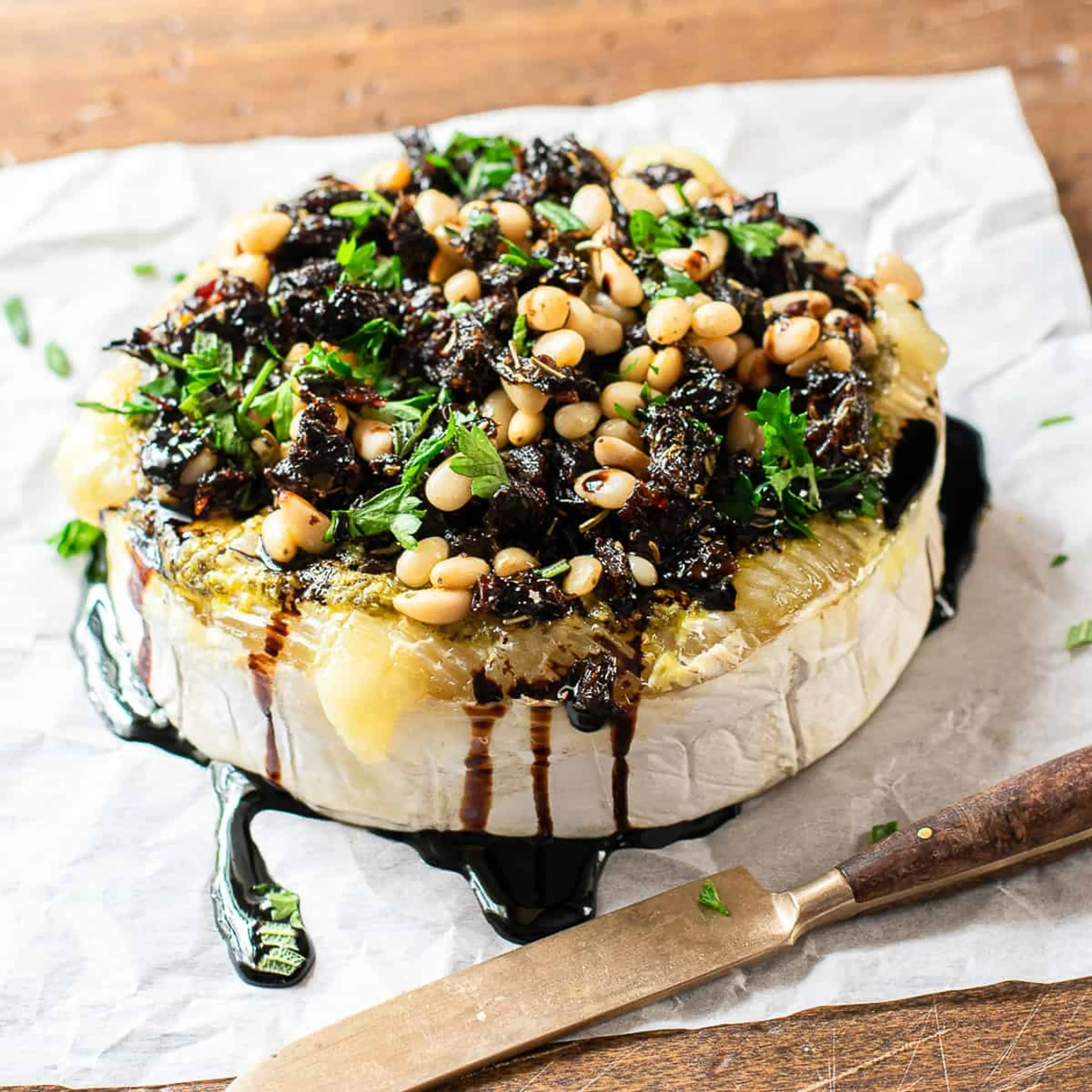 Baked Brie with Pesto & Sundried Tomatoes