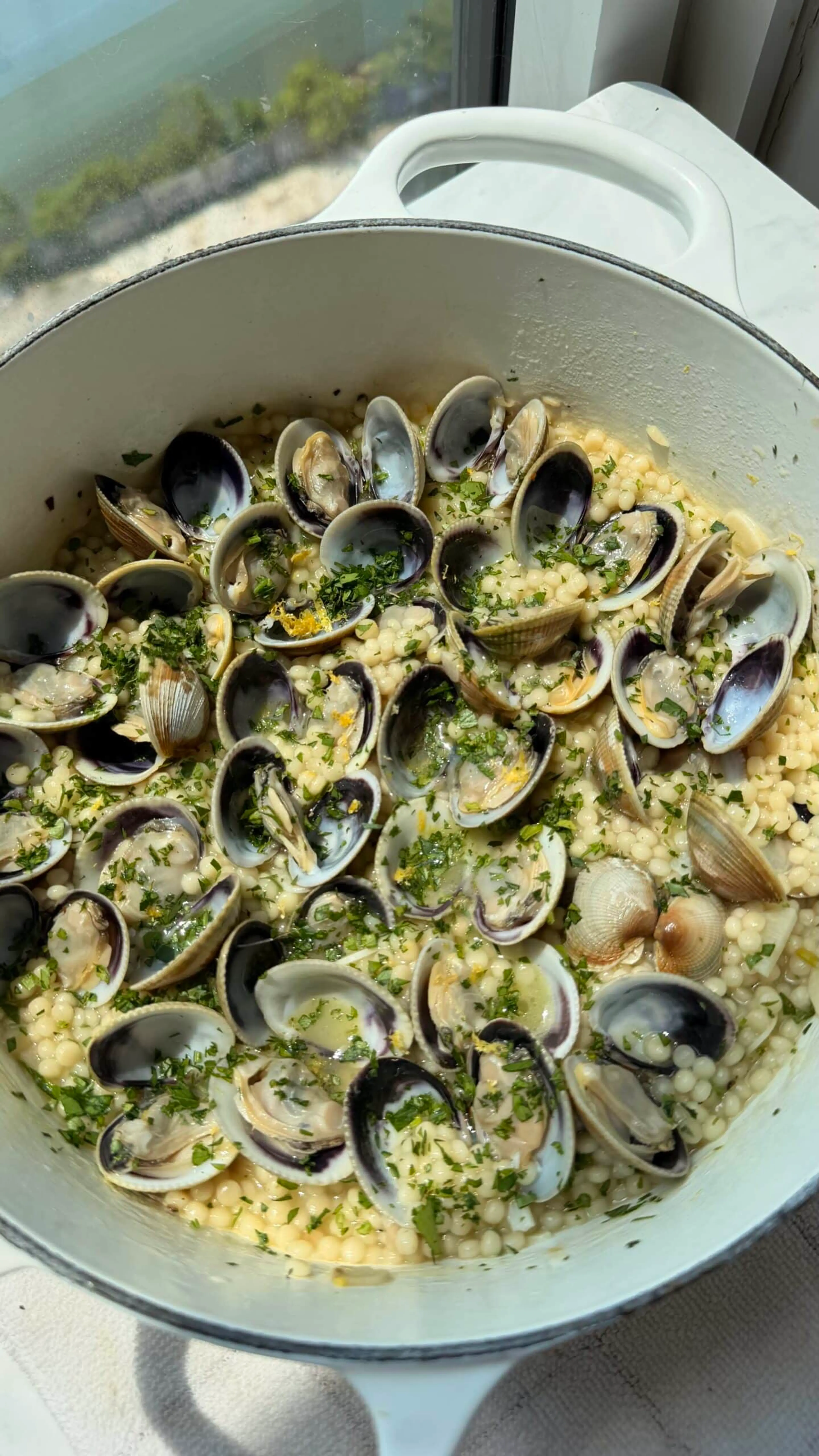 Cockles with Pearl Couscous, White Wine, and Herbs