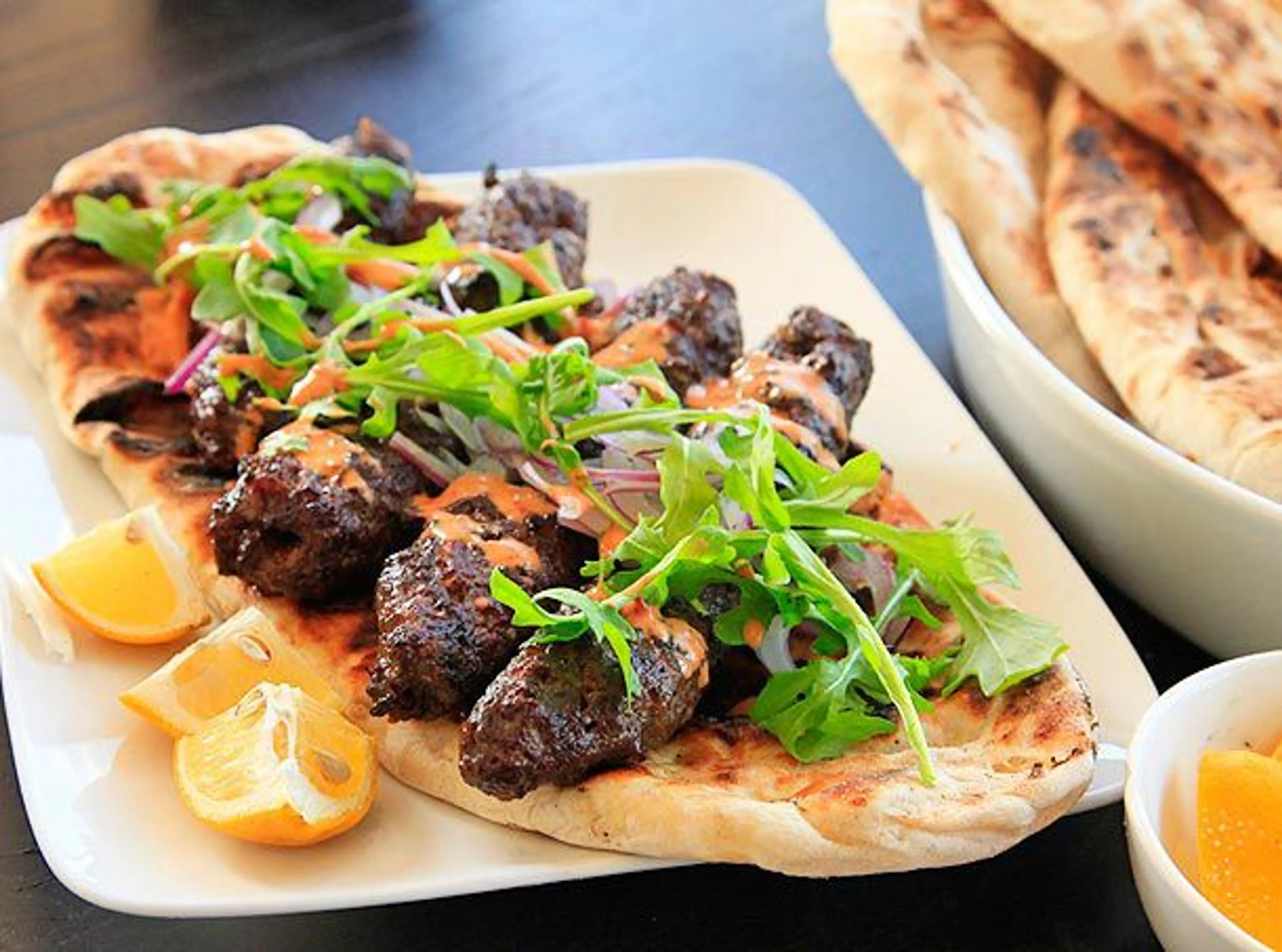 Kofte Kebabs With Harissa Yogurt Sauce and Grilled Flatbread