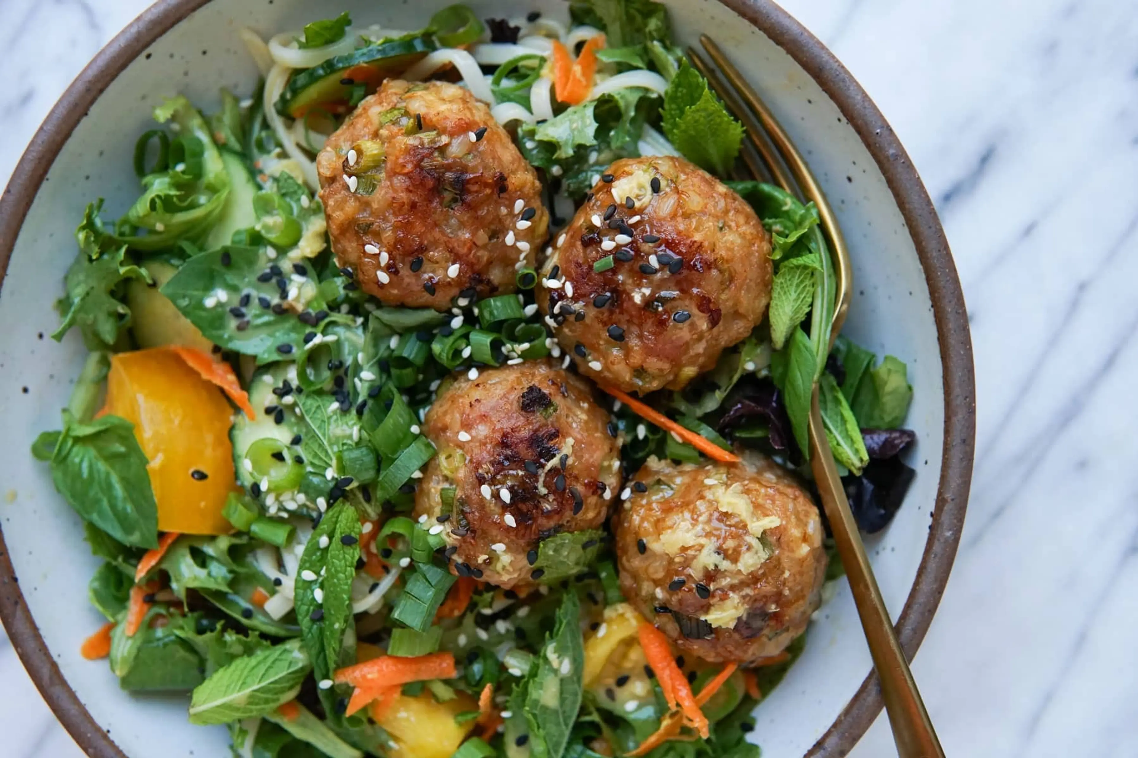 Sesame Chicken Meatball Salad with Orange Ginger Dressing