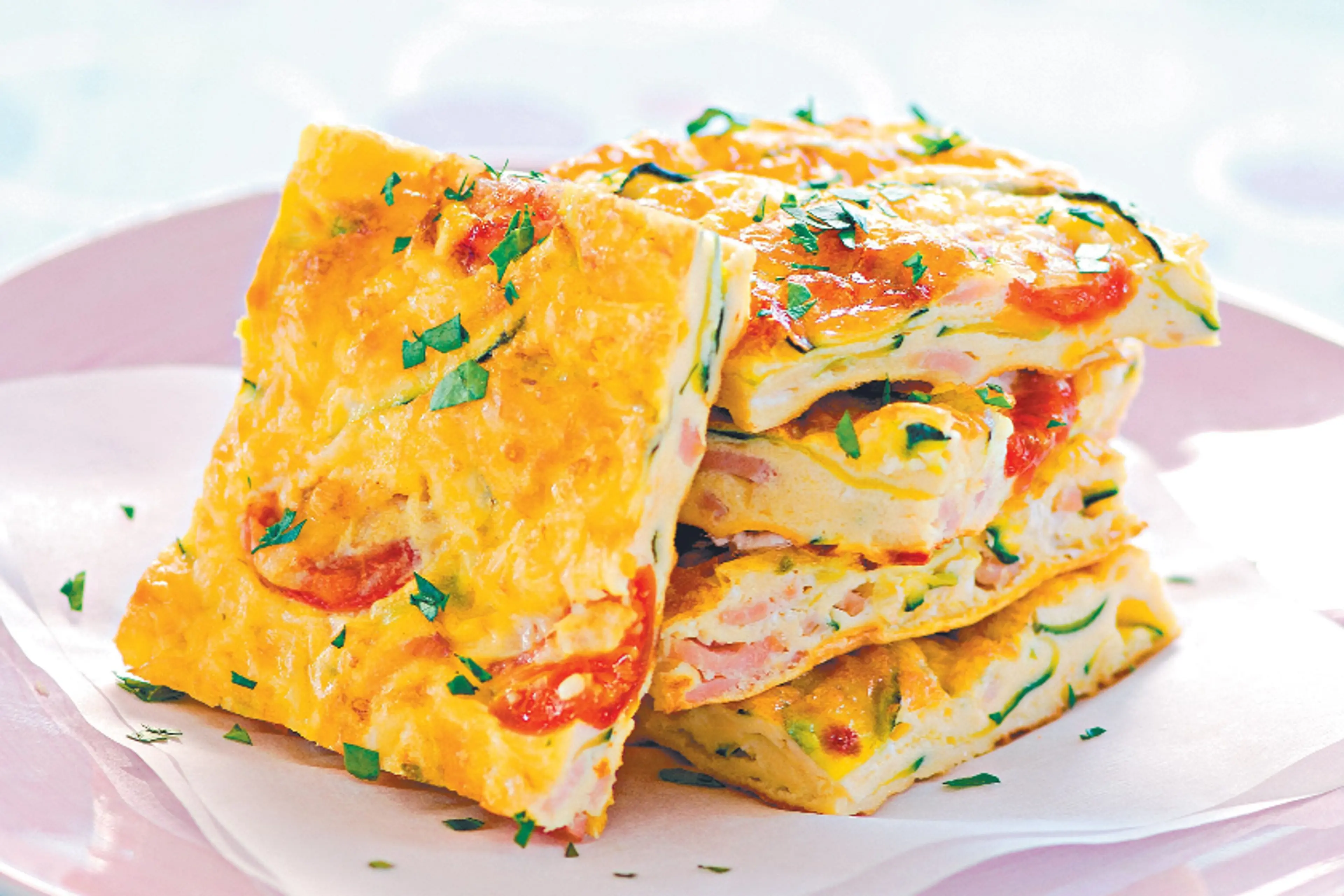Baked zucchini, bacon and tomato frittata