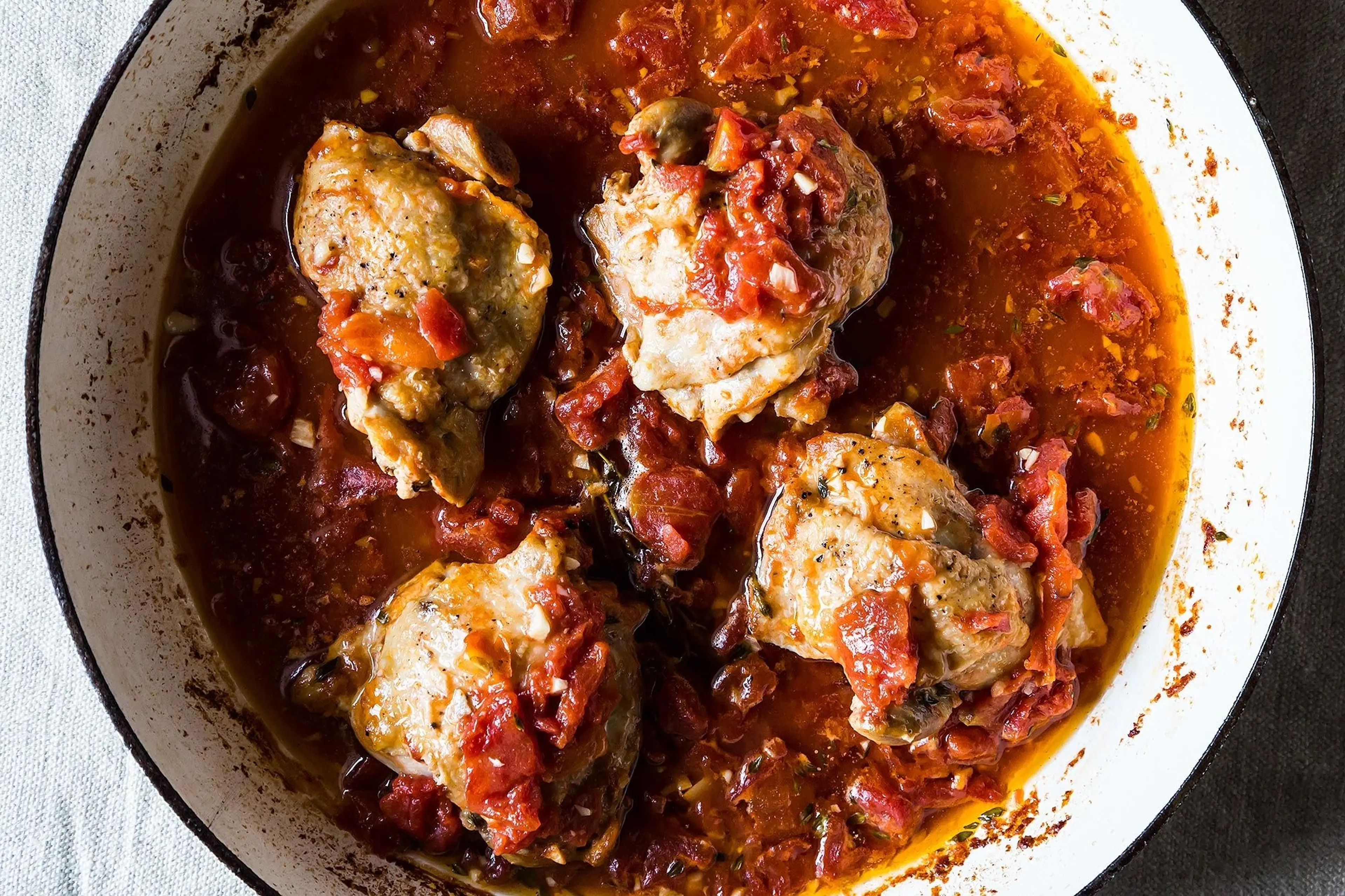 Braised Chicken Thighs With Tomato & Garlic