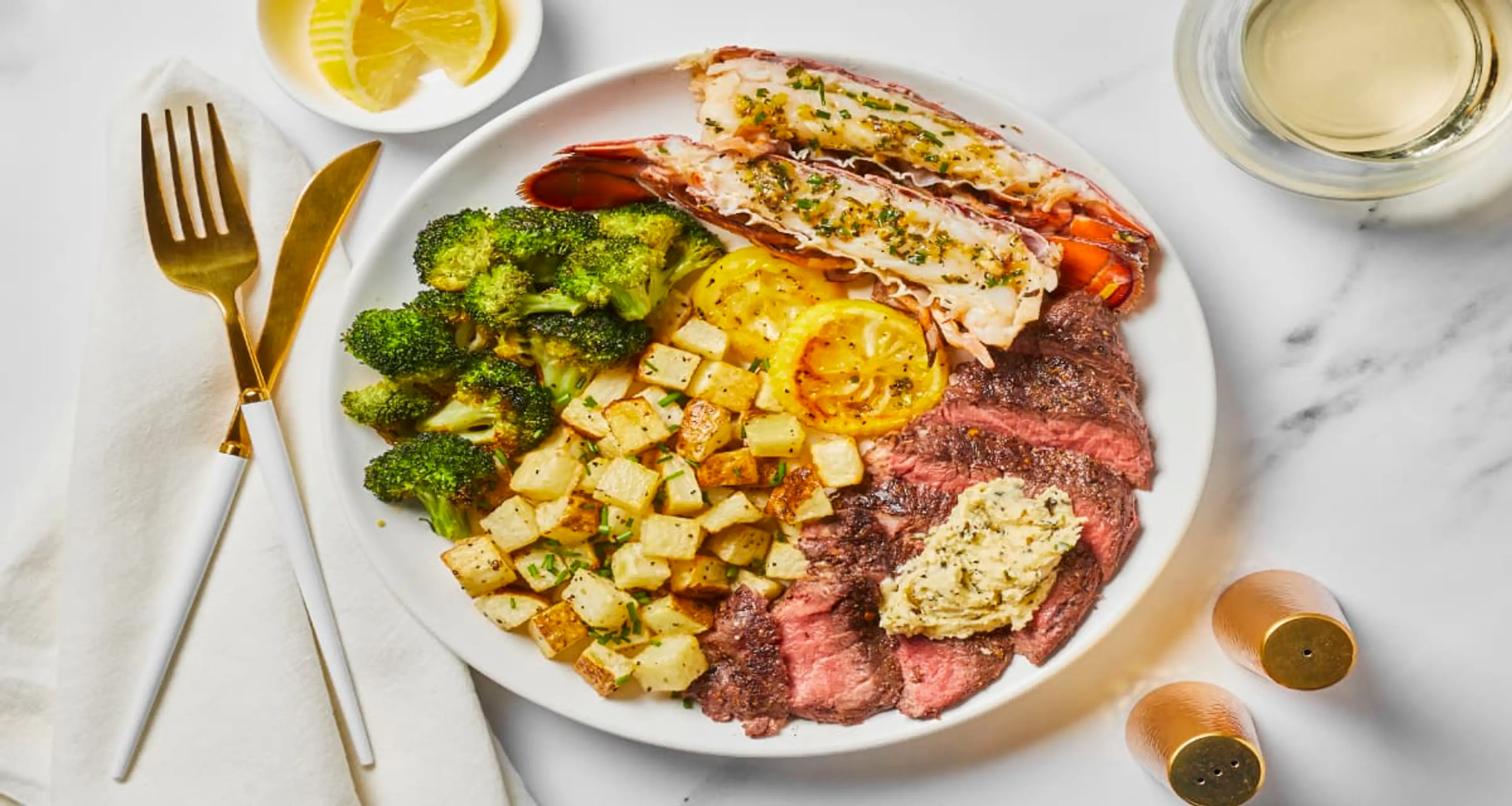 Garlic Herb Butter Steak & Lobster Tails with Lemony Broccol