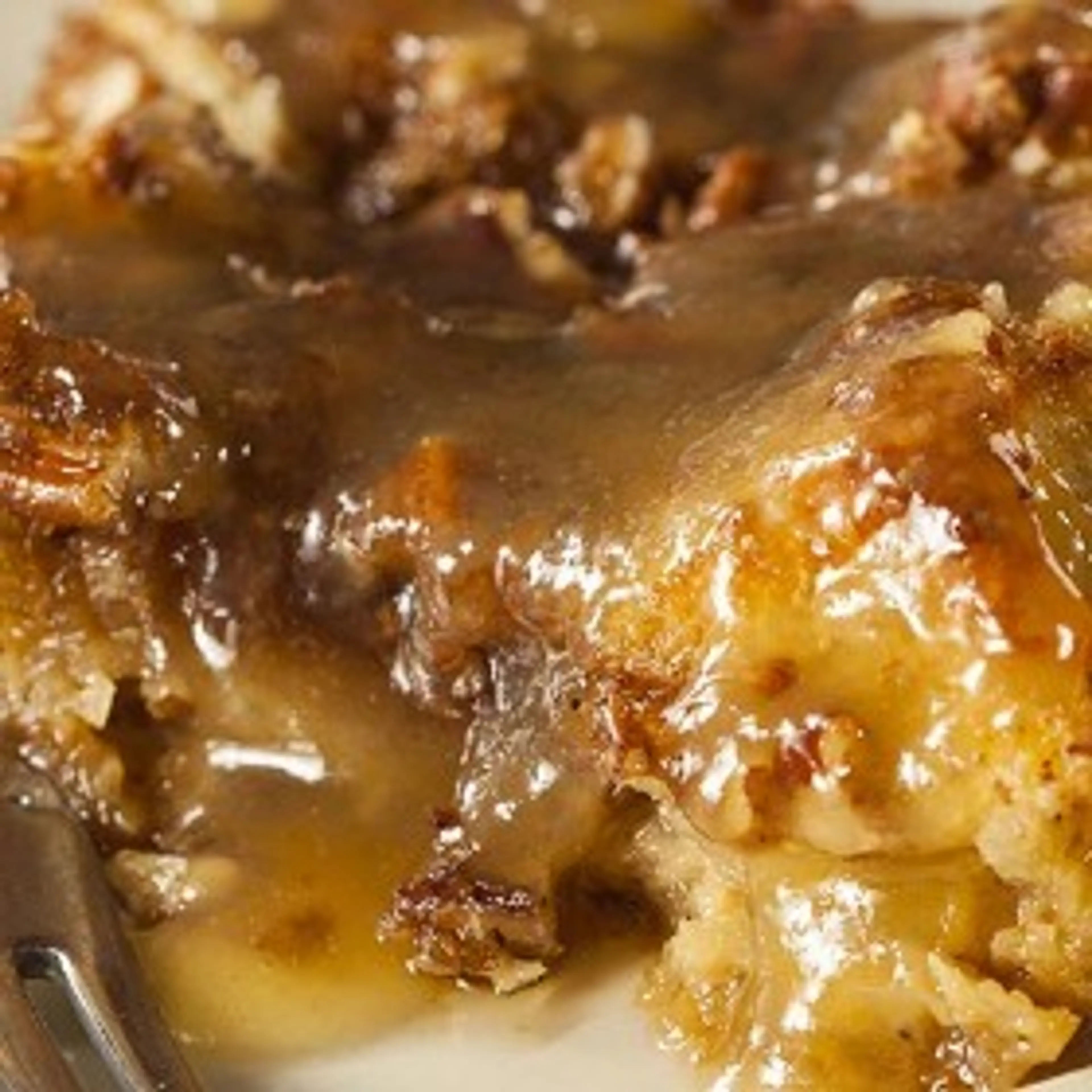 Cinnamon Raisin Bread Pudding with Honey Whiskey Sauce