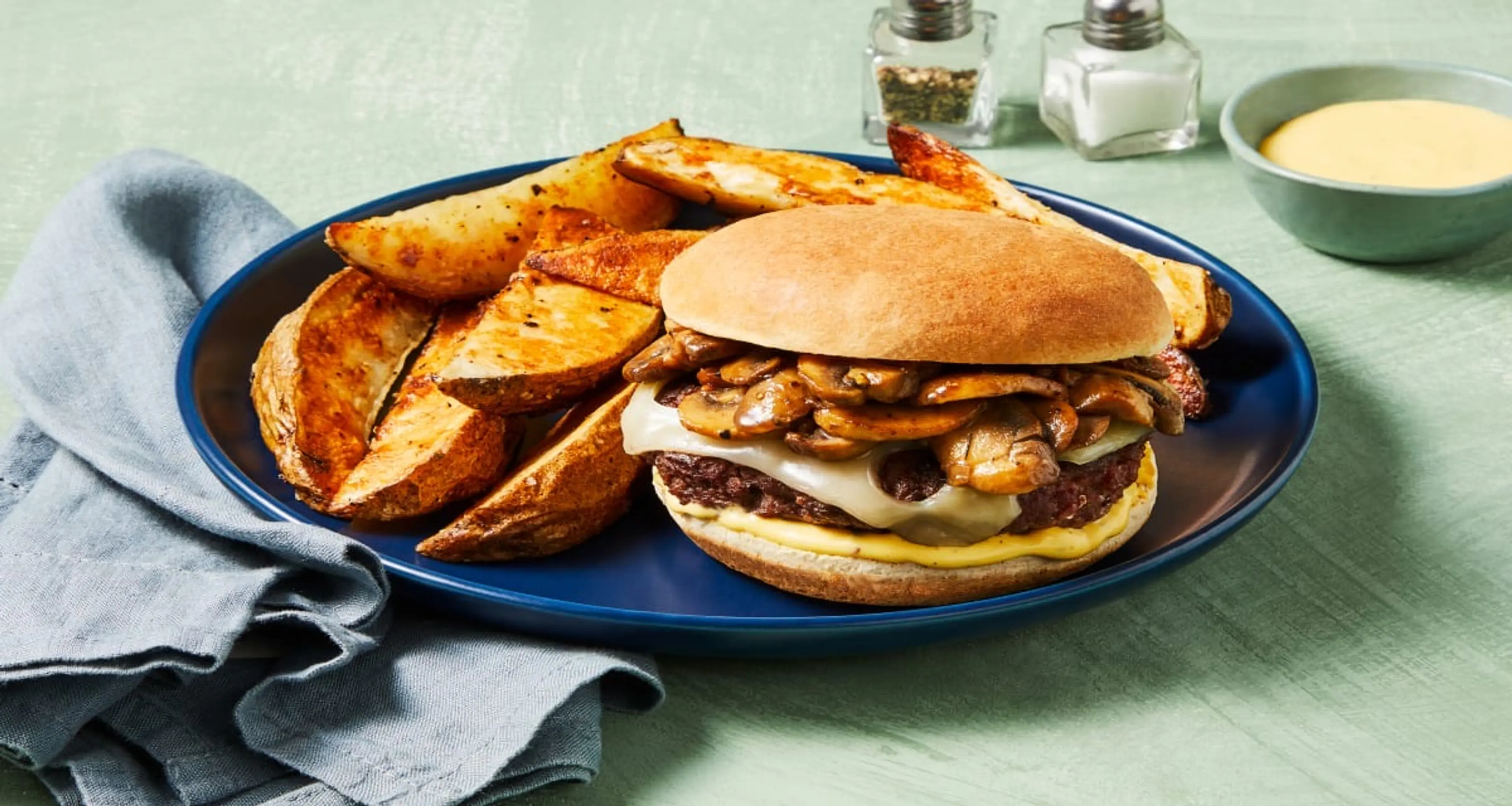 ’Shroom ’n’ Swiss Beef Burgers with Potato Wedges & a Creamy