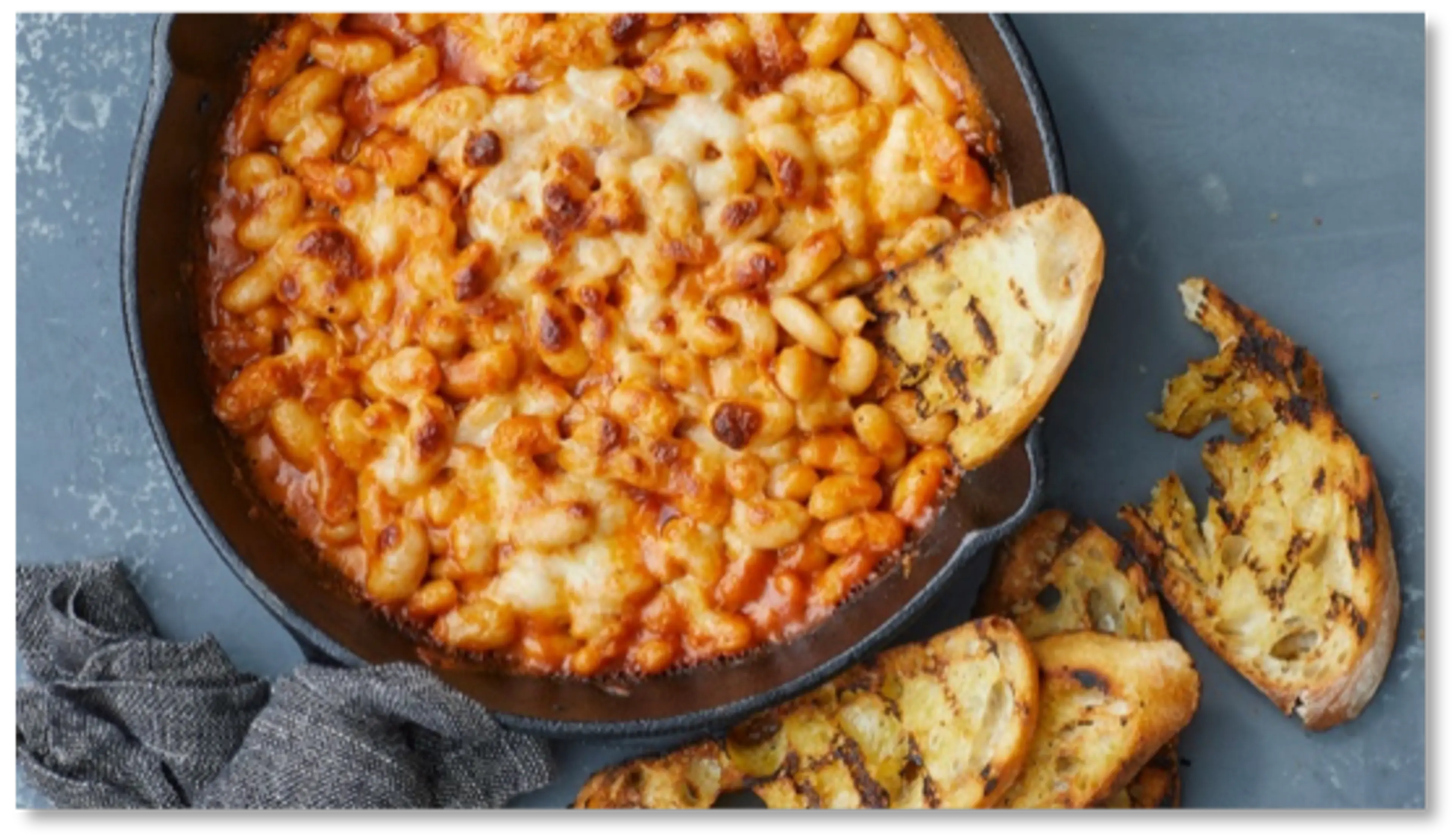 Cheesy Calypso Bean and Tomato Bake