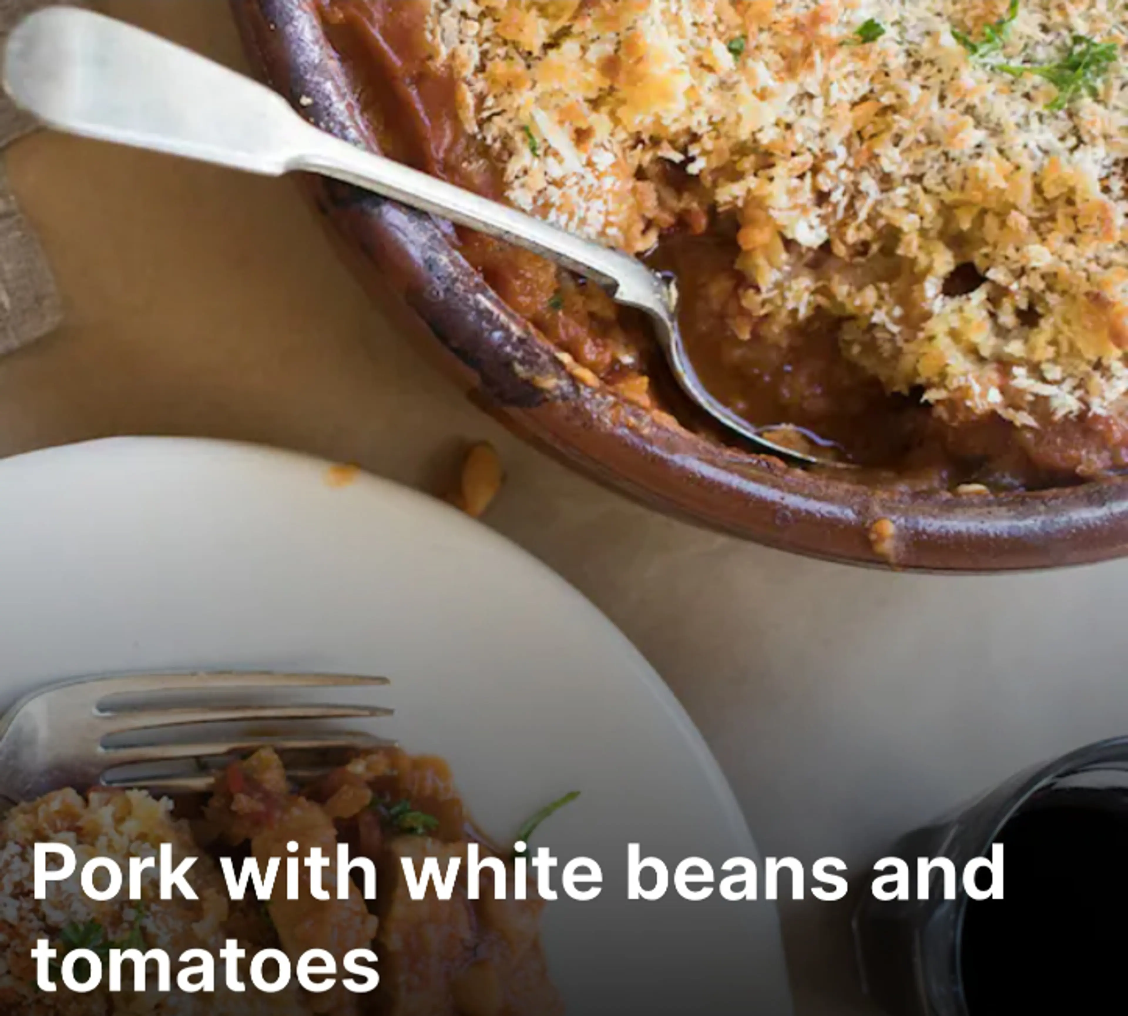 Pork with white beans and tomatoes