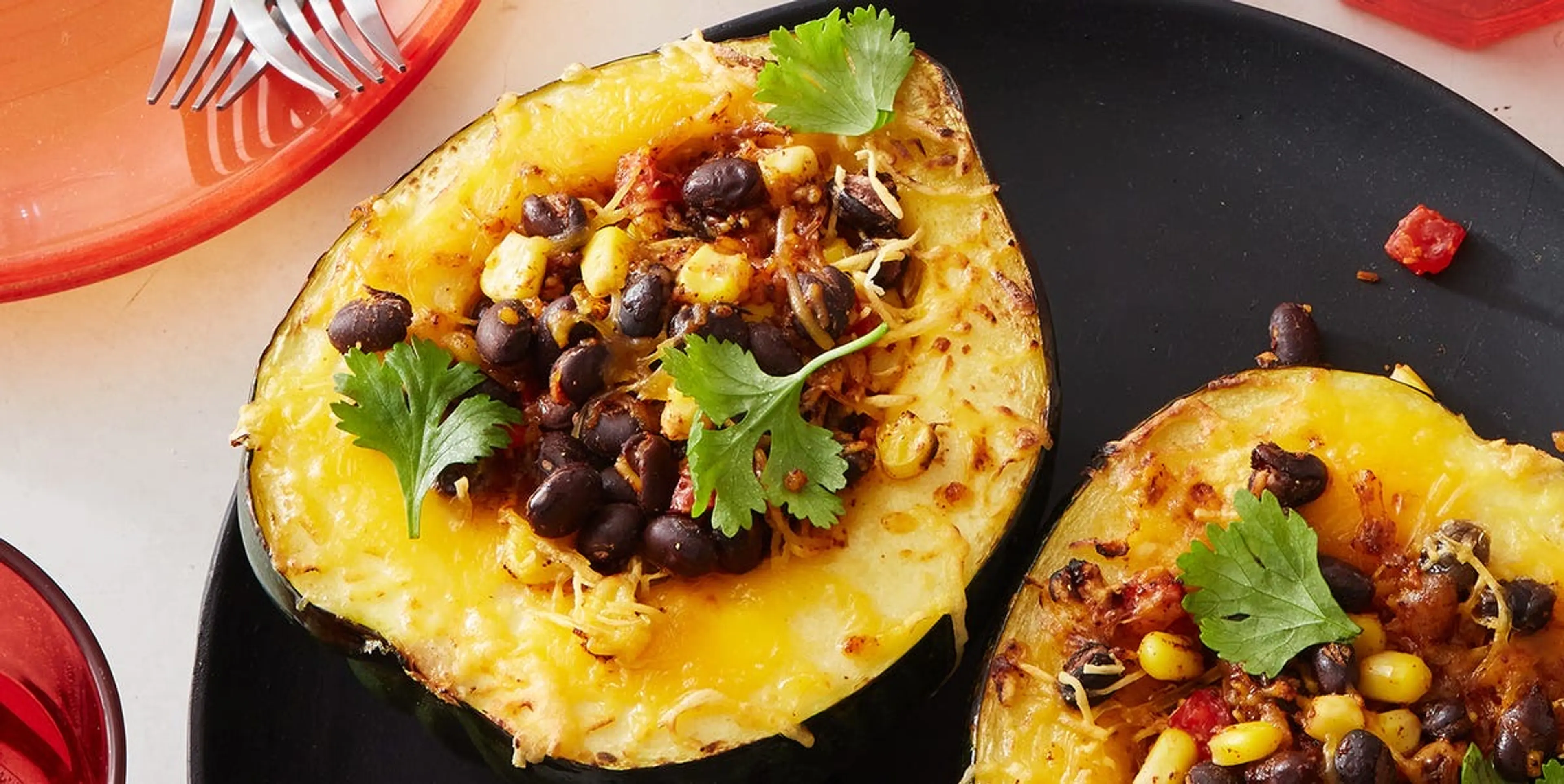 Air Fryer Acorn Squash with Black Beans, Corn, and Cheese