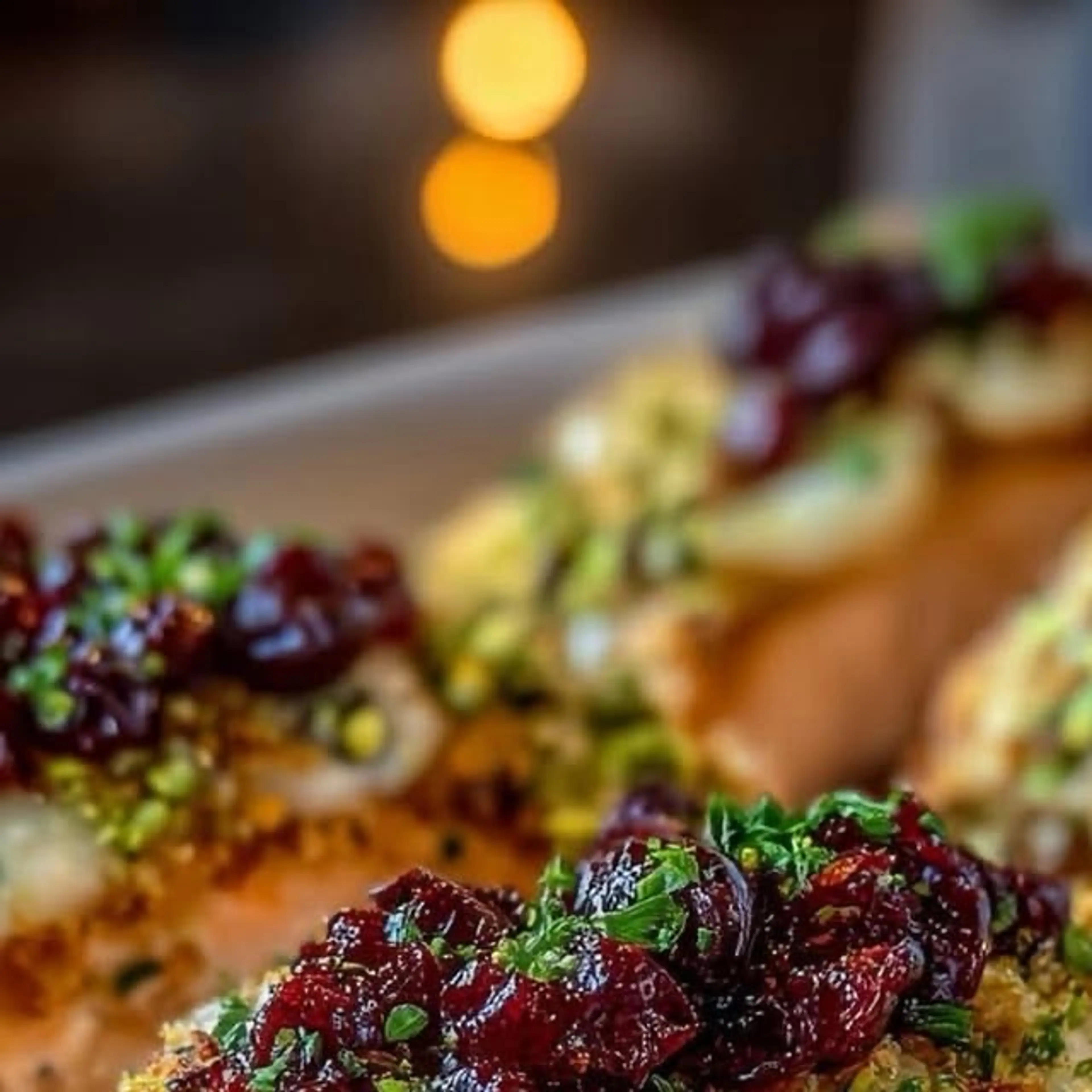 Salmon with Cranberry-brie Crust & Pistachio Sprinkle