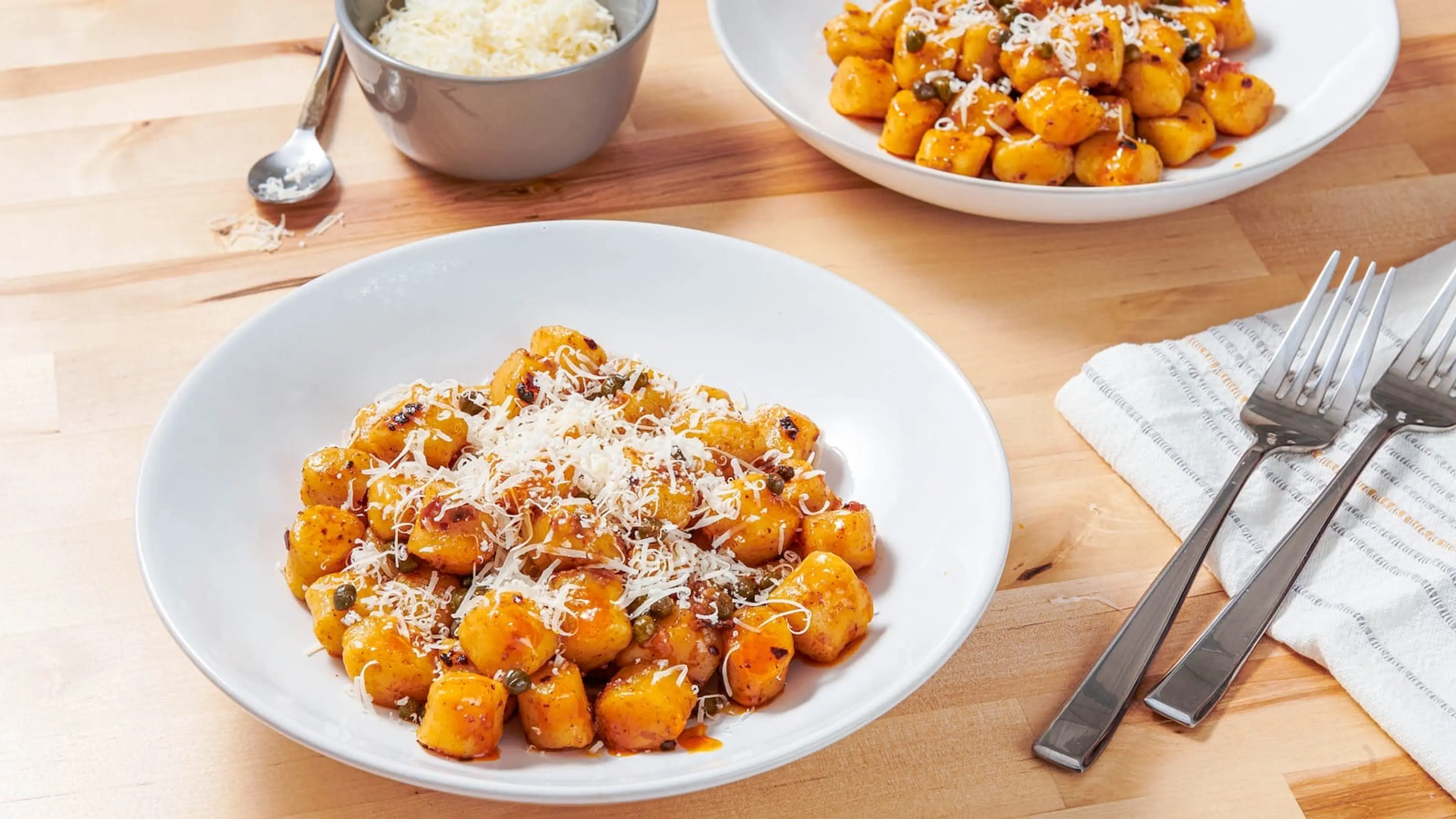 Gnocchi With Chili Crisp Sauce, Capers and Parmesan