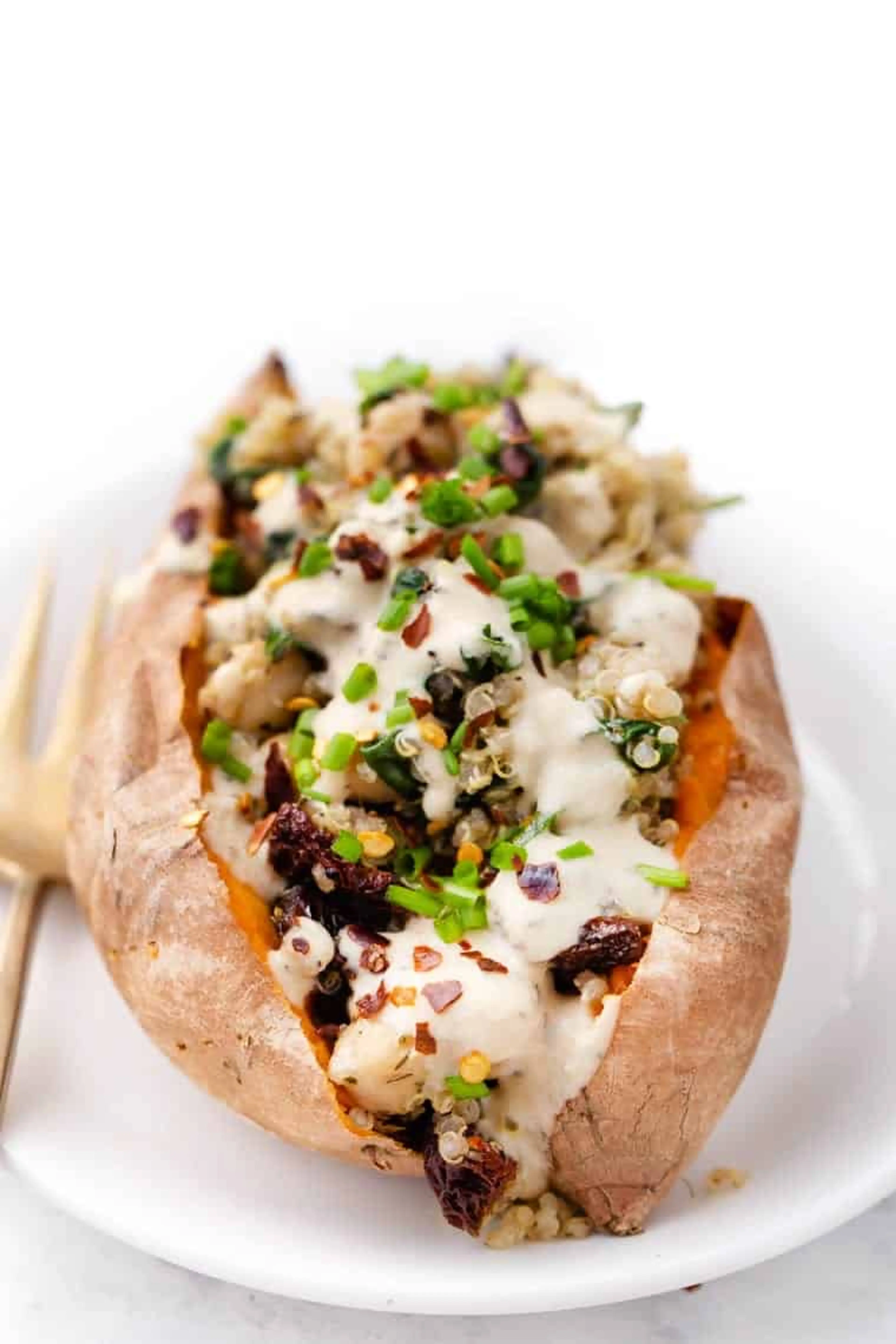 Vegan Stuffed Sweet Potatoes with Mediterranean Quinoa