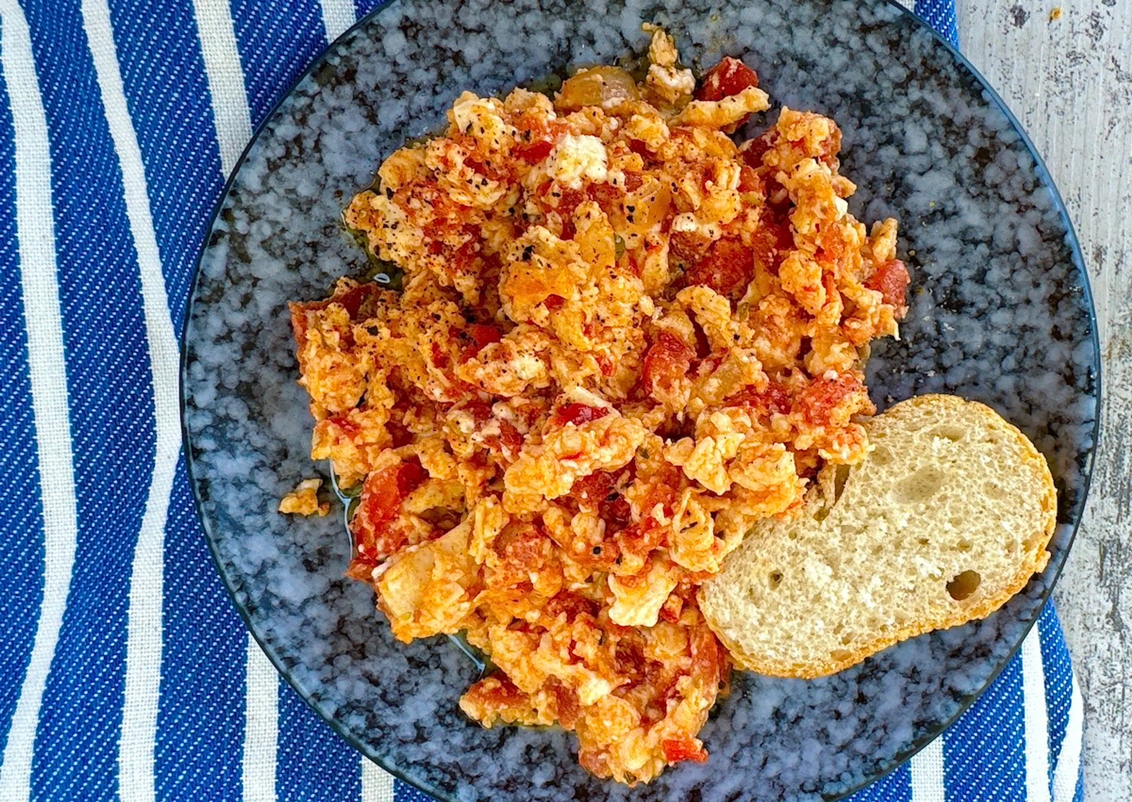 Greek Style Scrambled Eggs with Cherry Tomatoes and Feta - K