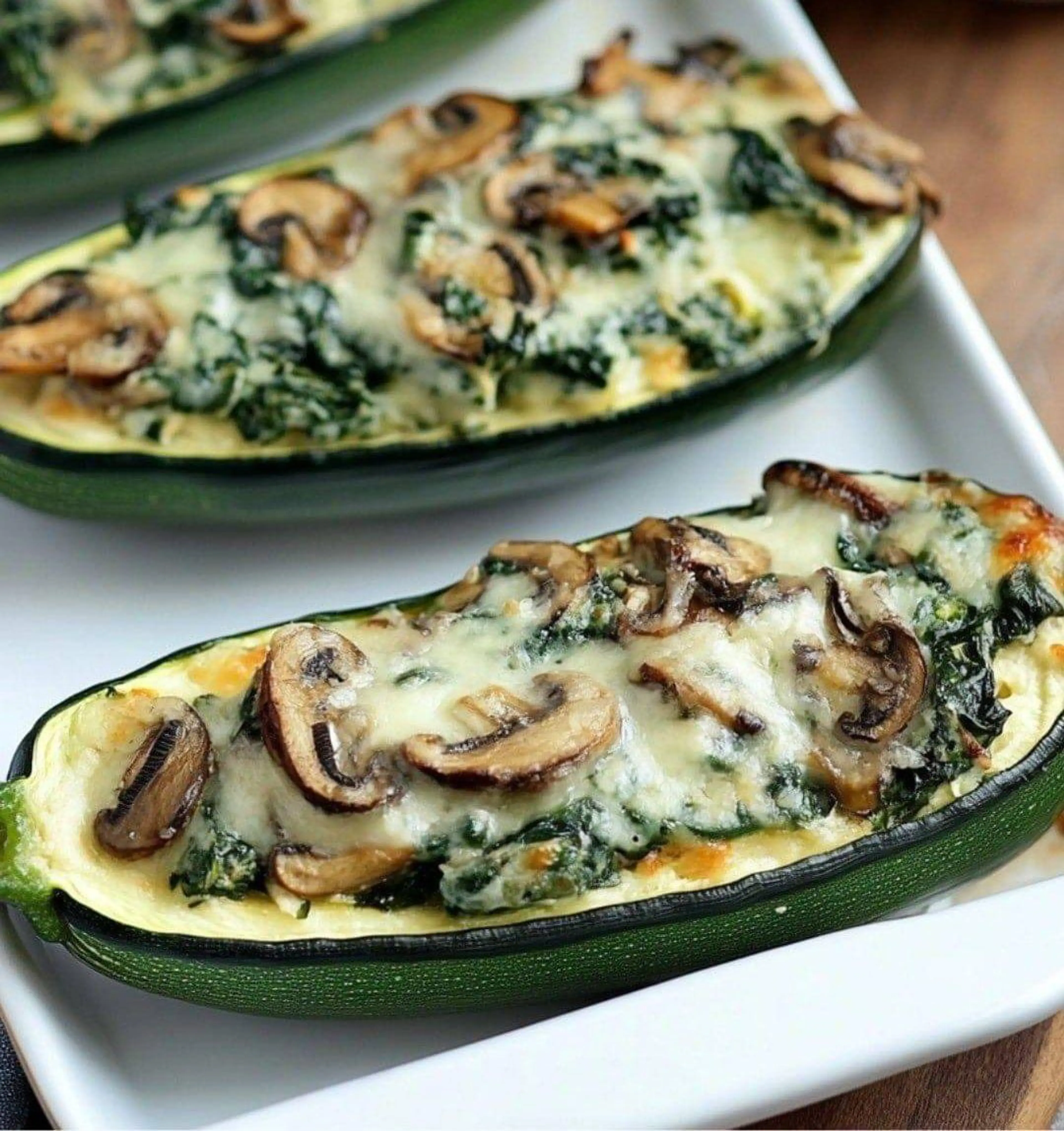 Zucchini Boats stuffed with Spinach Mushroom Ricotta