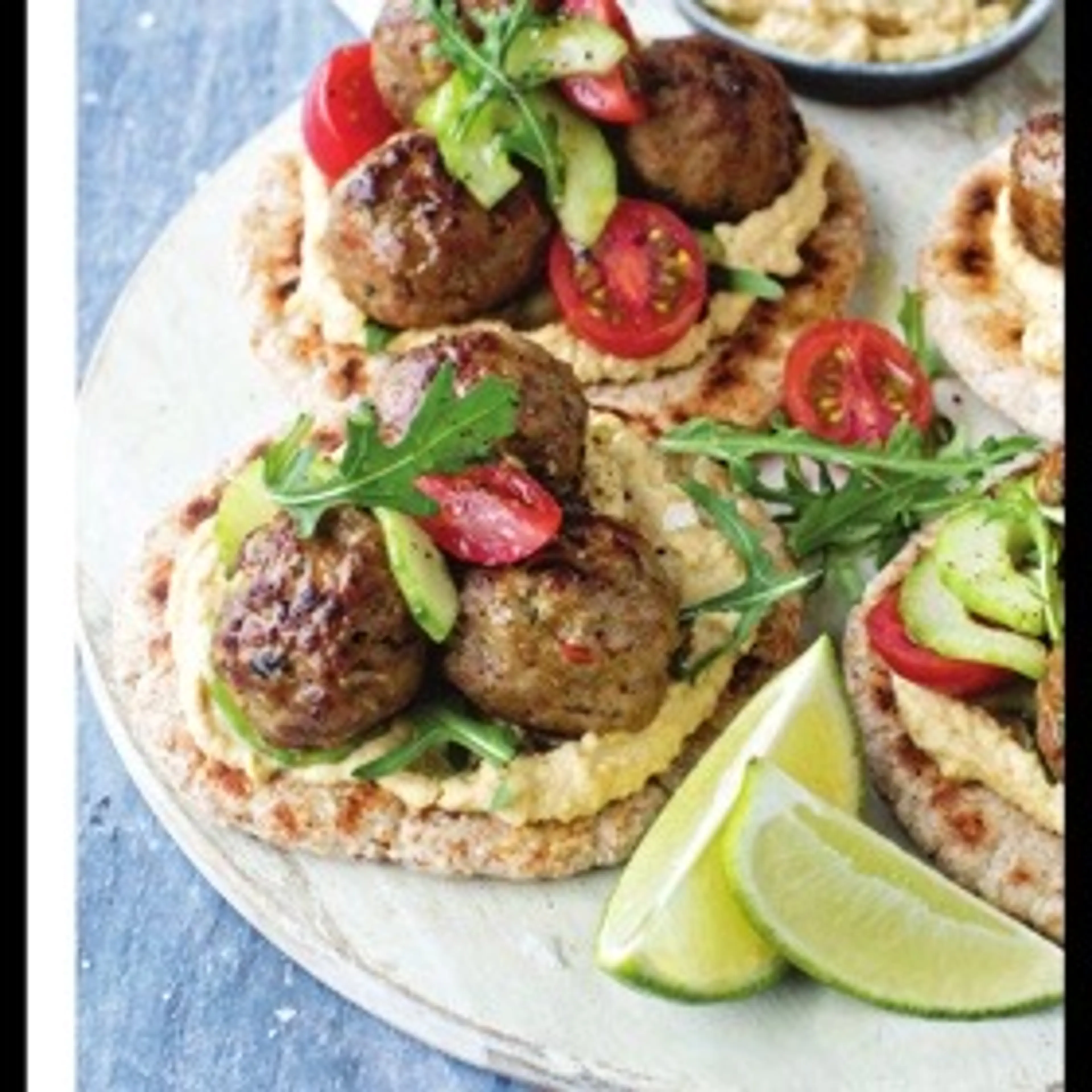 Lamb koftas with cherry tomato and cucumber salad
