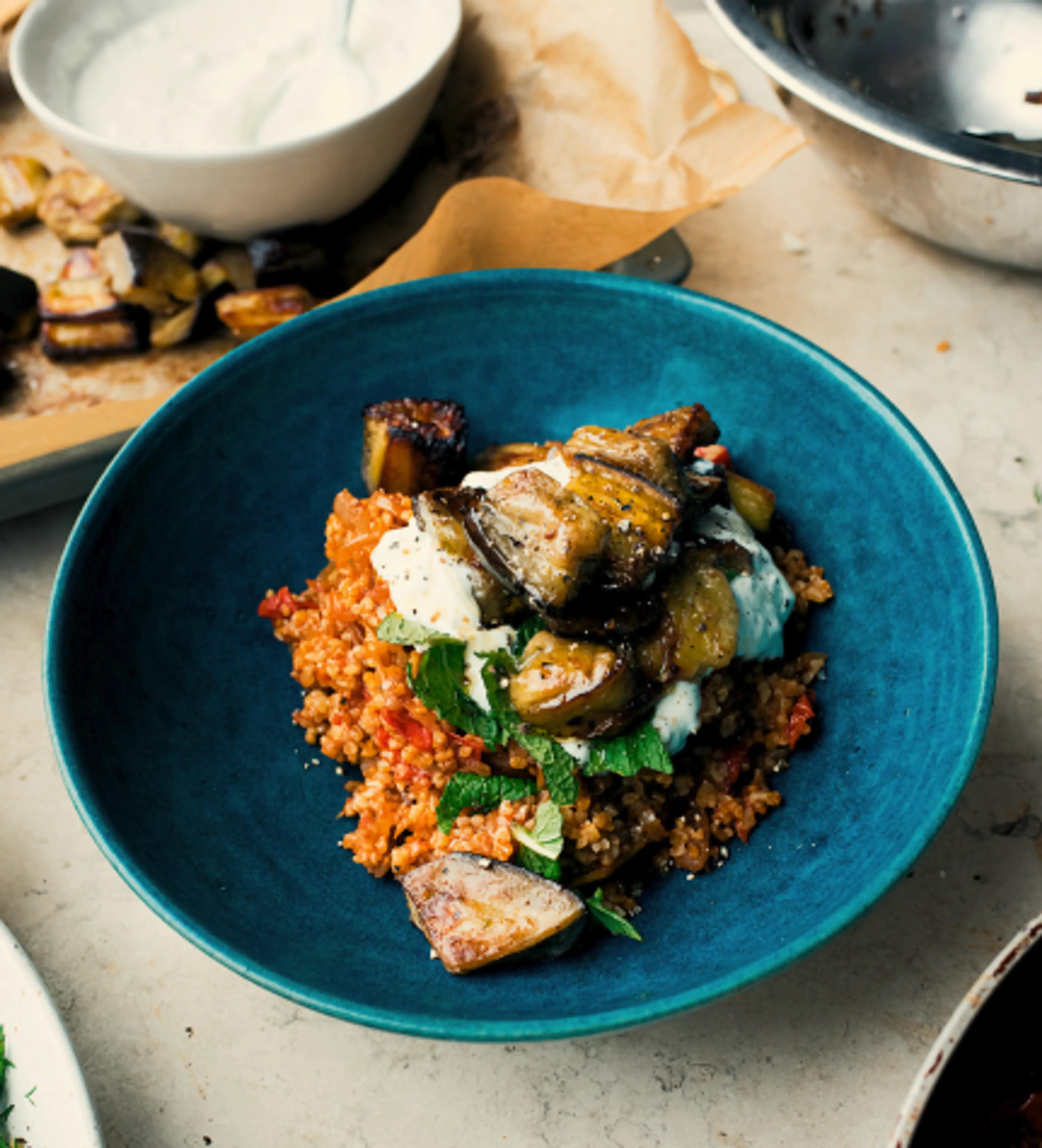 Bulgur with tomato, eggplant, and lemon yogurt