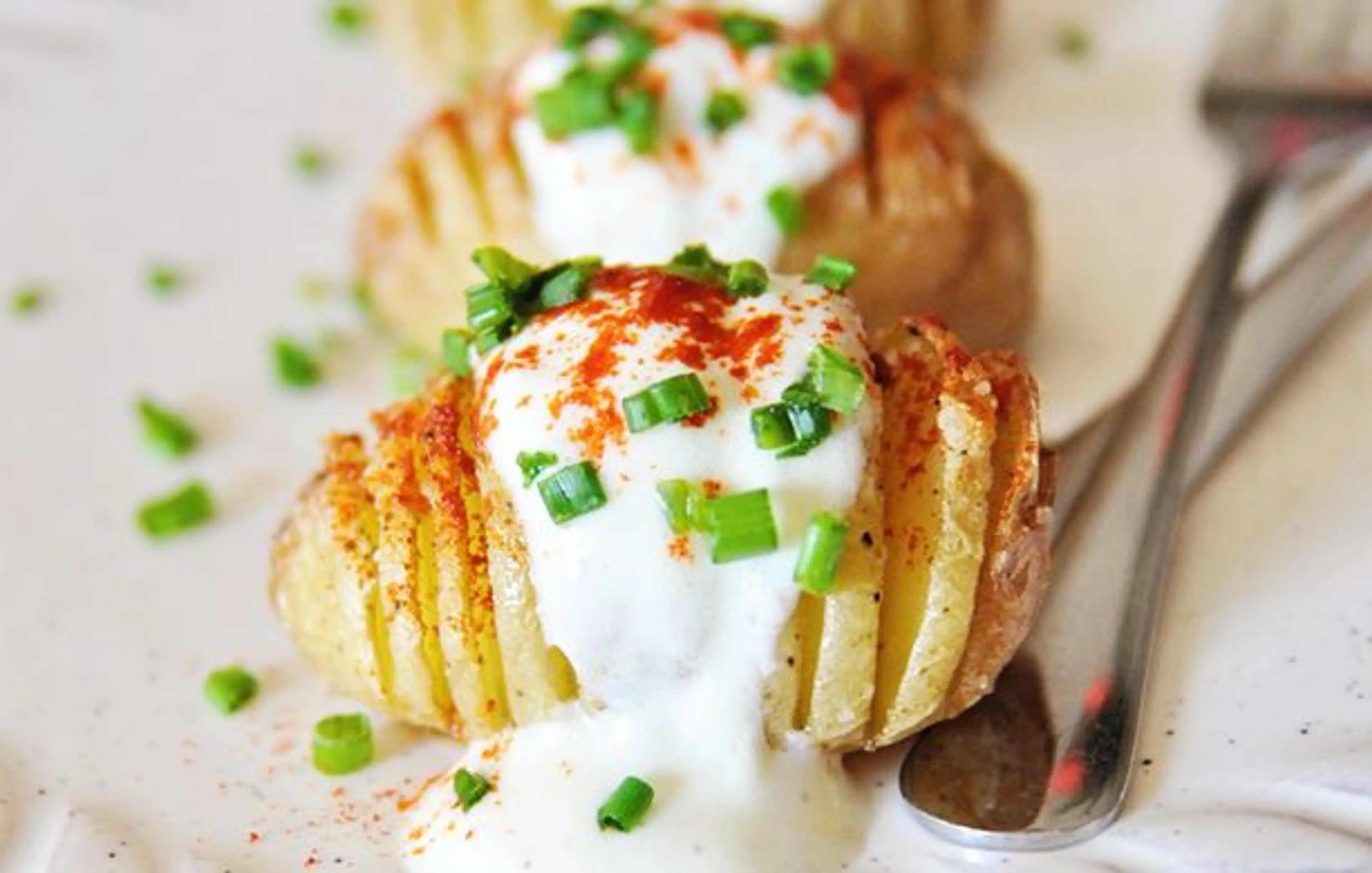 Hasselback Potatoes with Creamy Yogurt Sauce