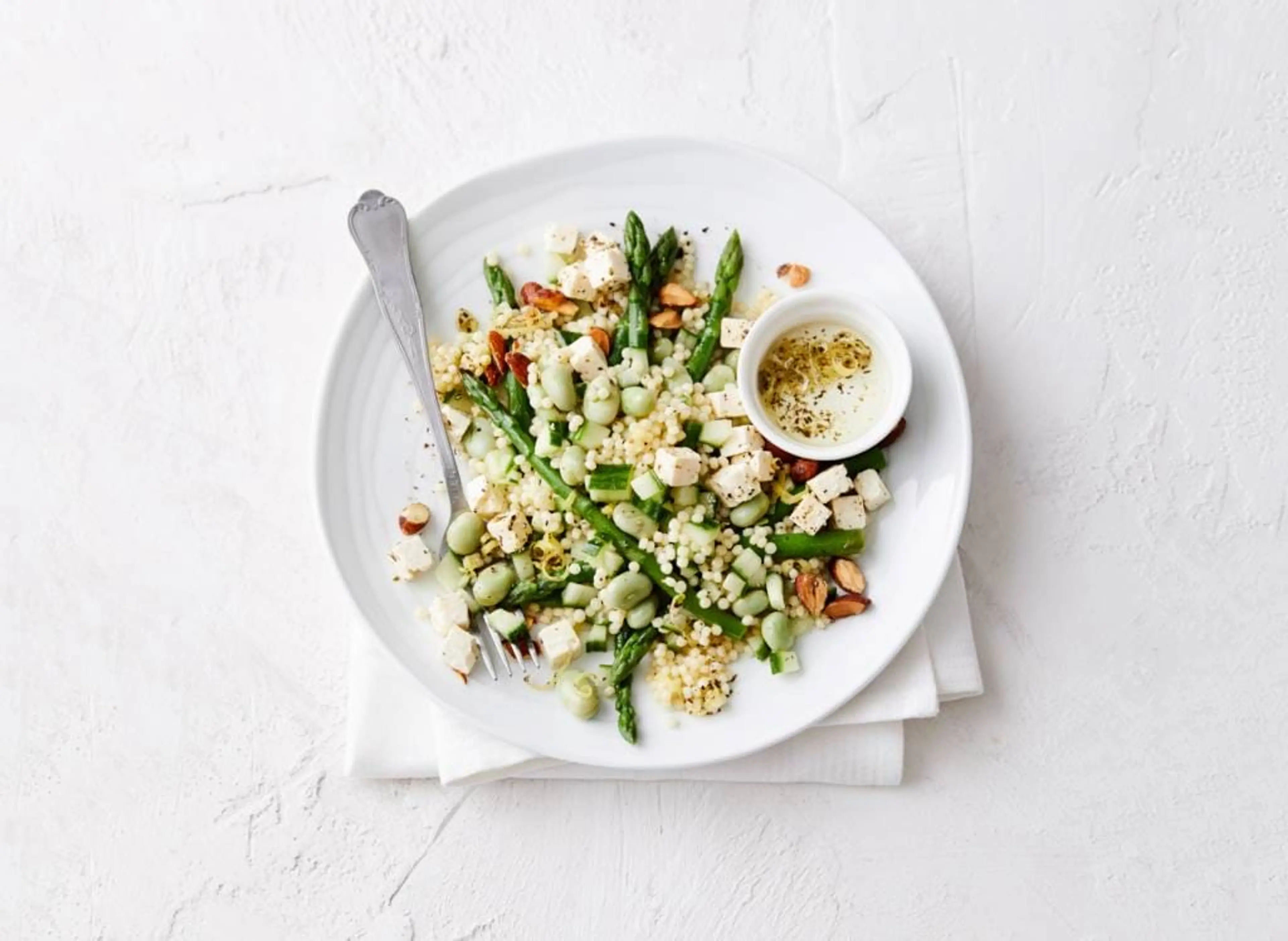 Parelcouscous met tuinbonen, feta en asperges