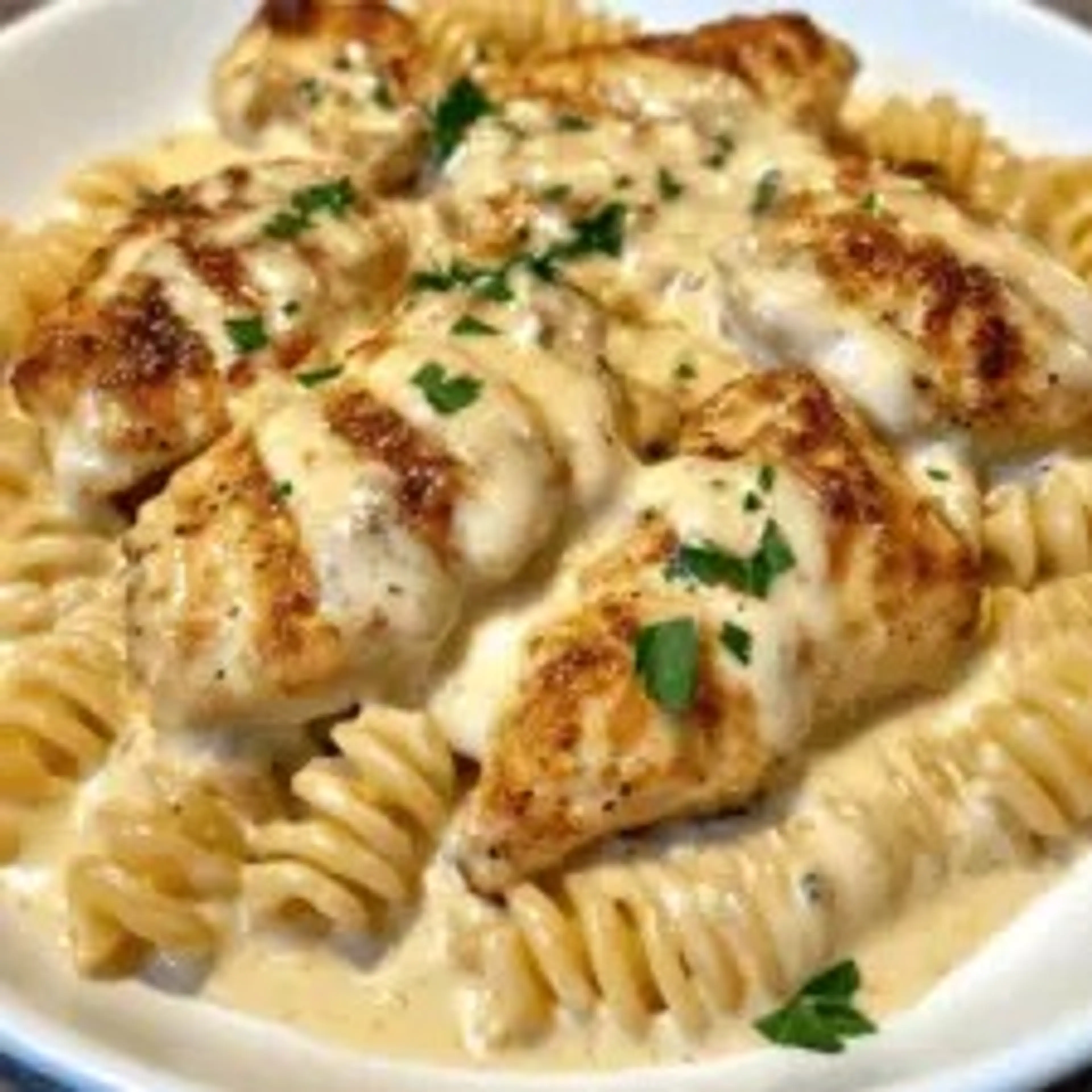 Creamy Garlic Butter Chicken and Rotini in Parmesan Sauce