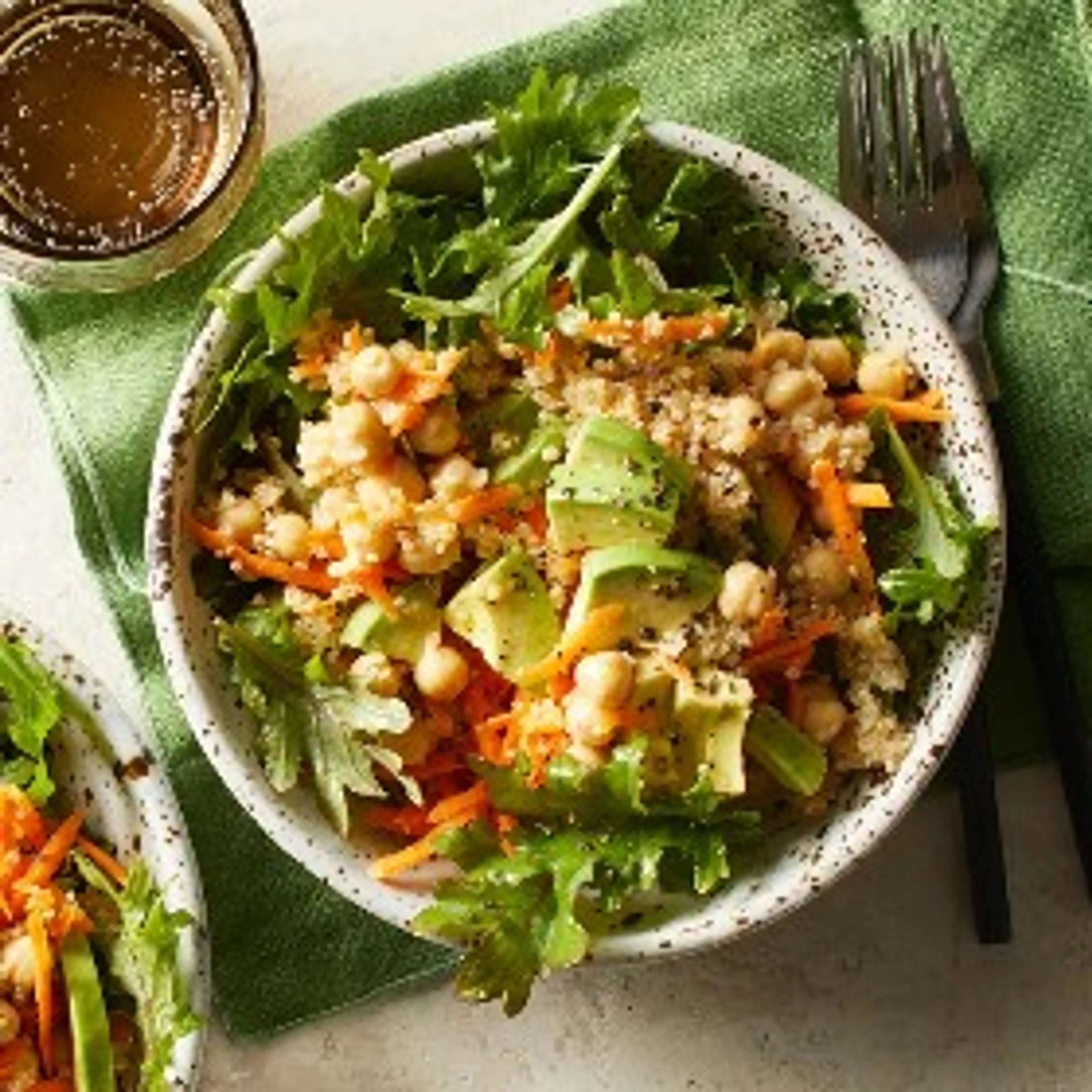 Quinoa, Avocado & Chickpea Salad Over Mixed Greens