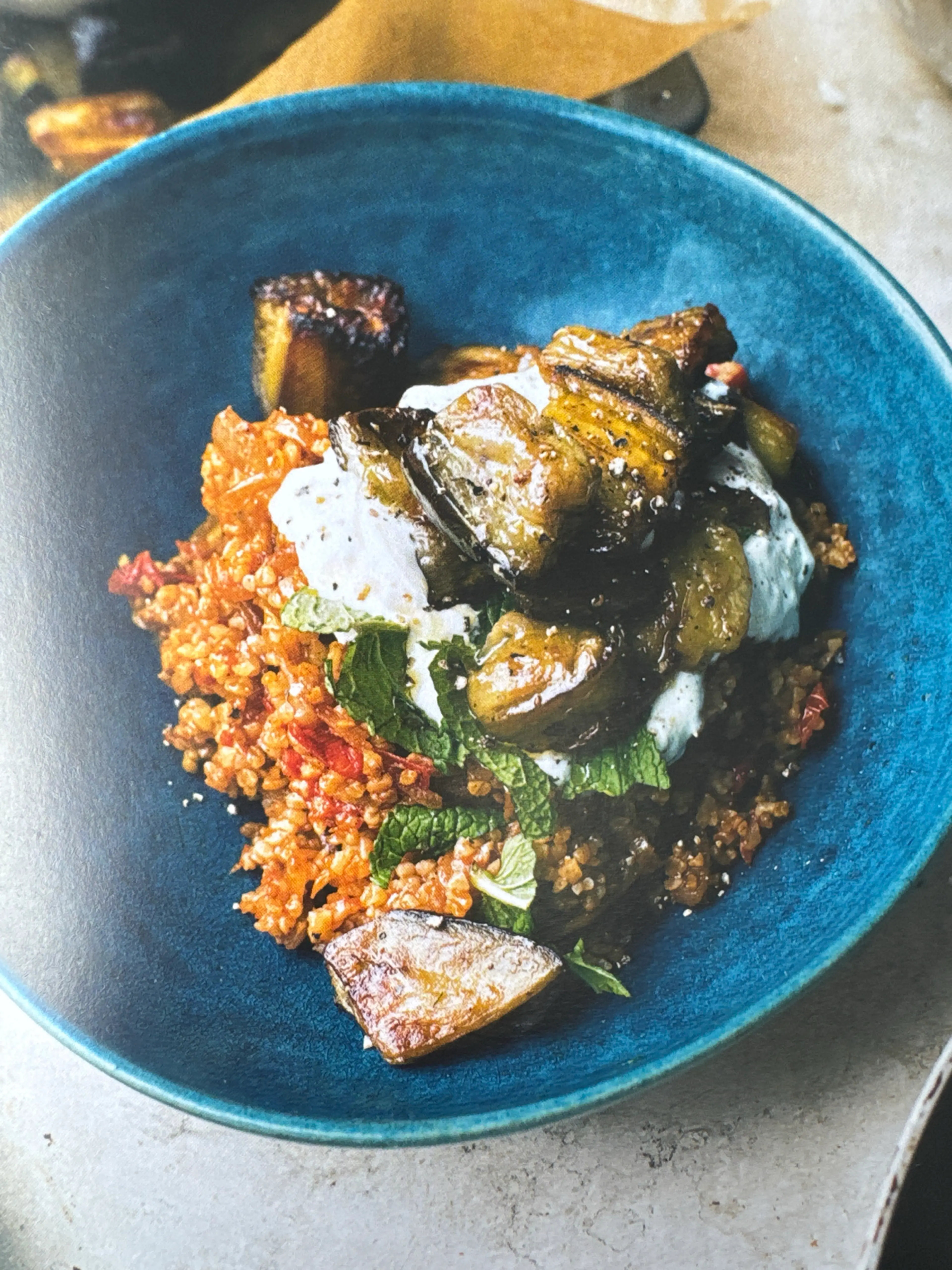 Bulgur with tomato, aubergine and lemon yoghurt
