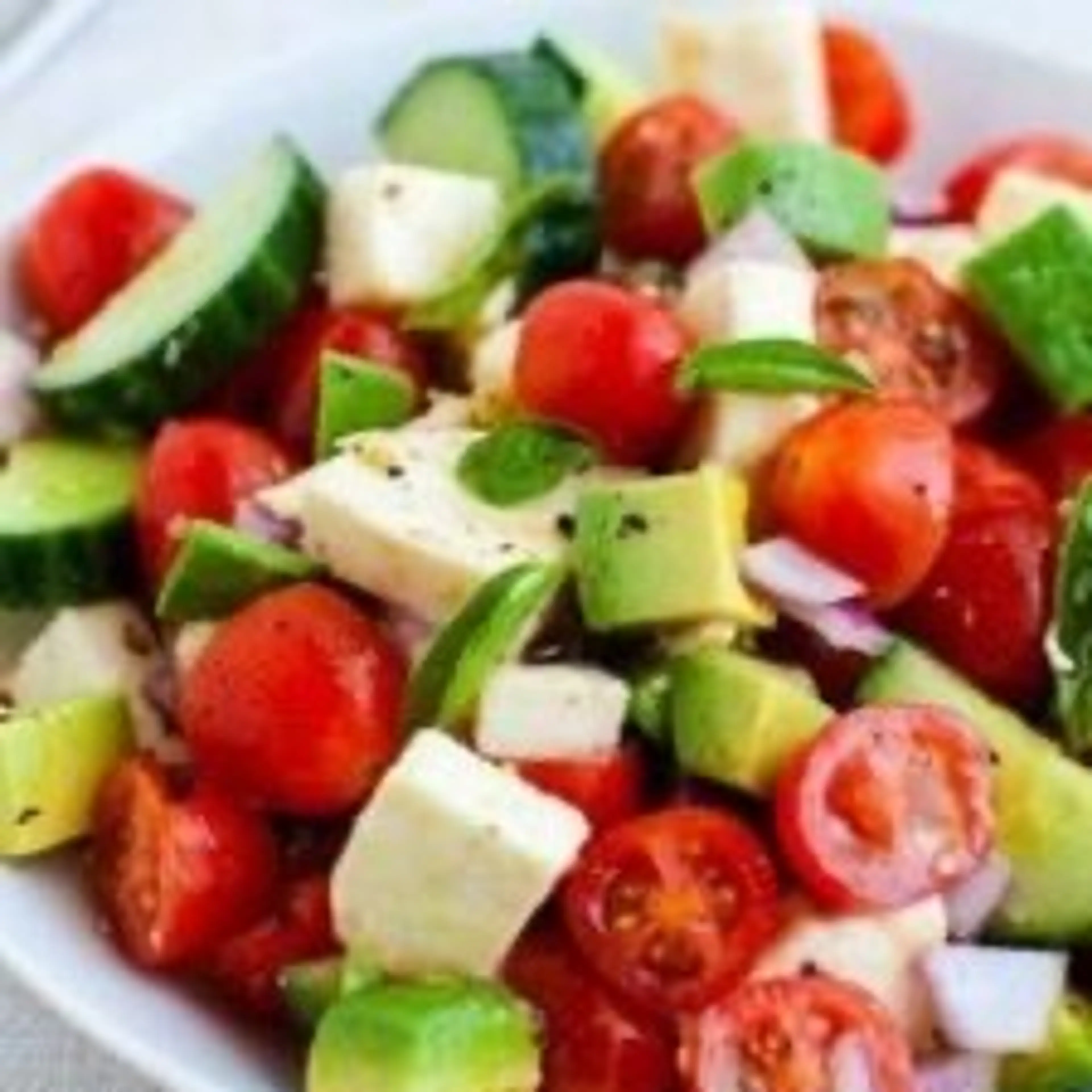 Tomato, Cucumber and Mozzarella Cheese Salad.