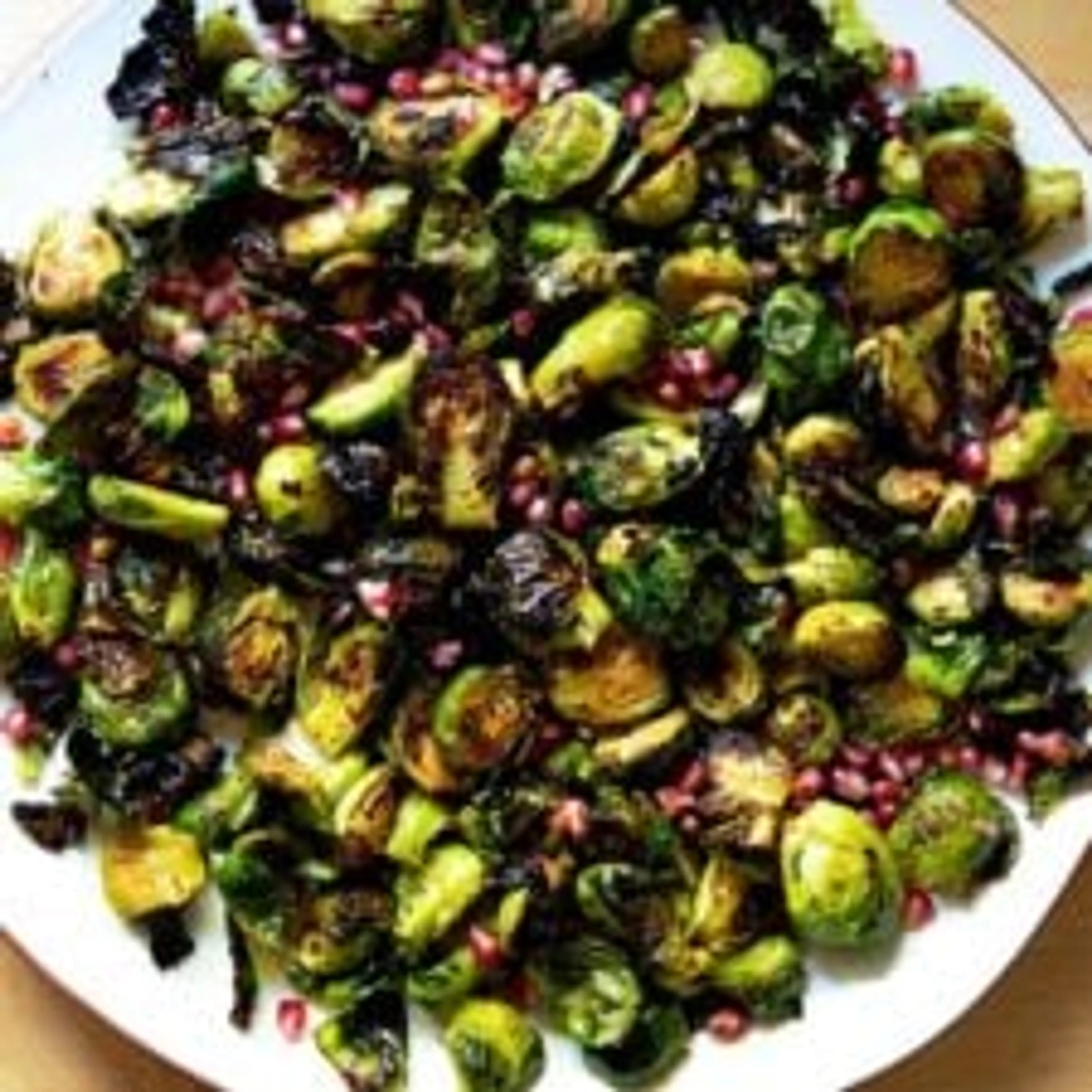Crispy Charred Brussels Sprouts with Pomegranate Butter