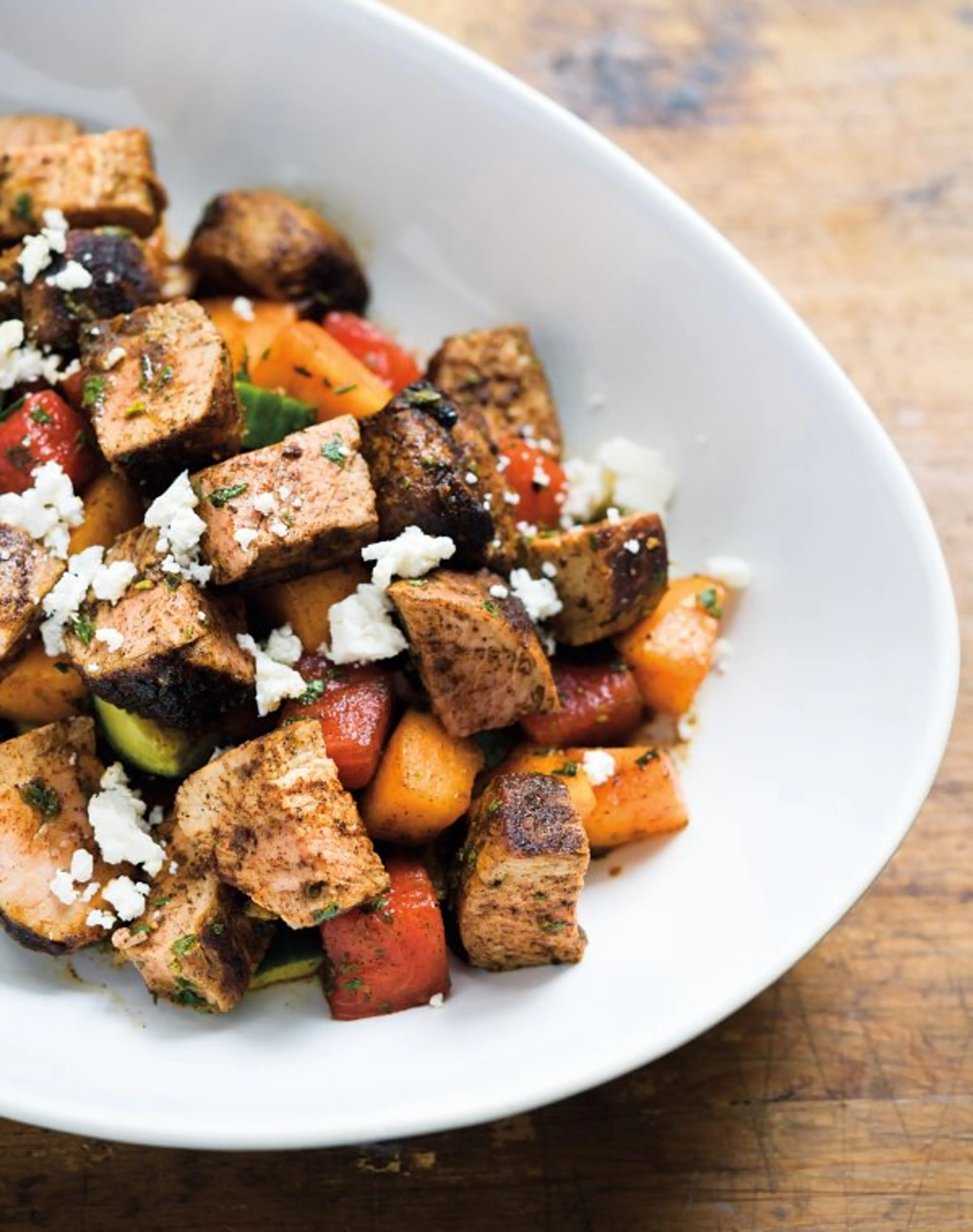 Chili-Rubbed Pork with Cucumber-Melon Salad