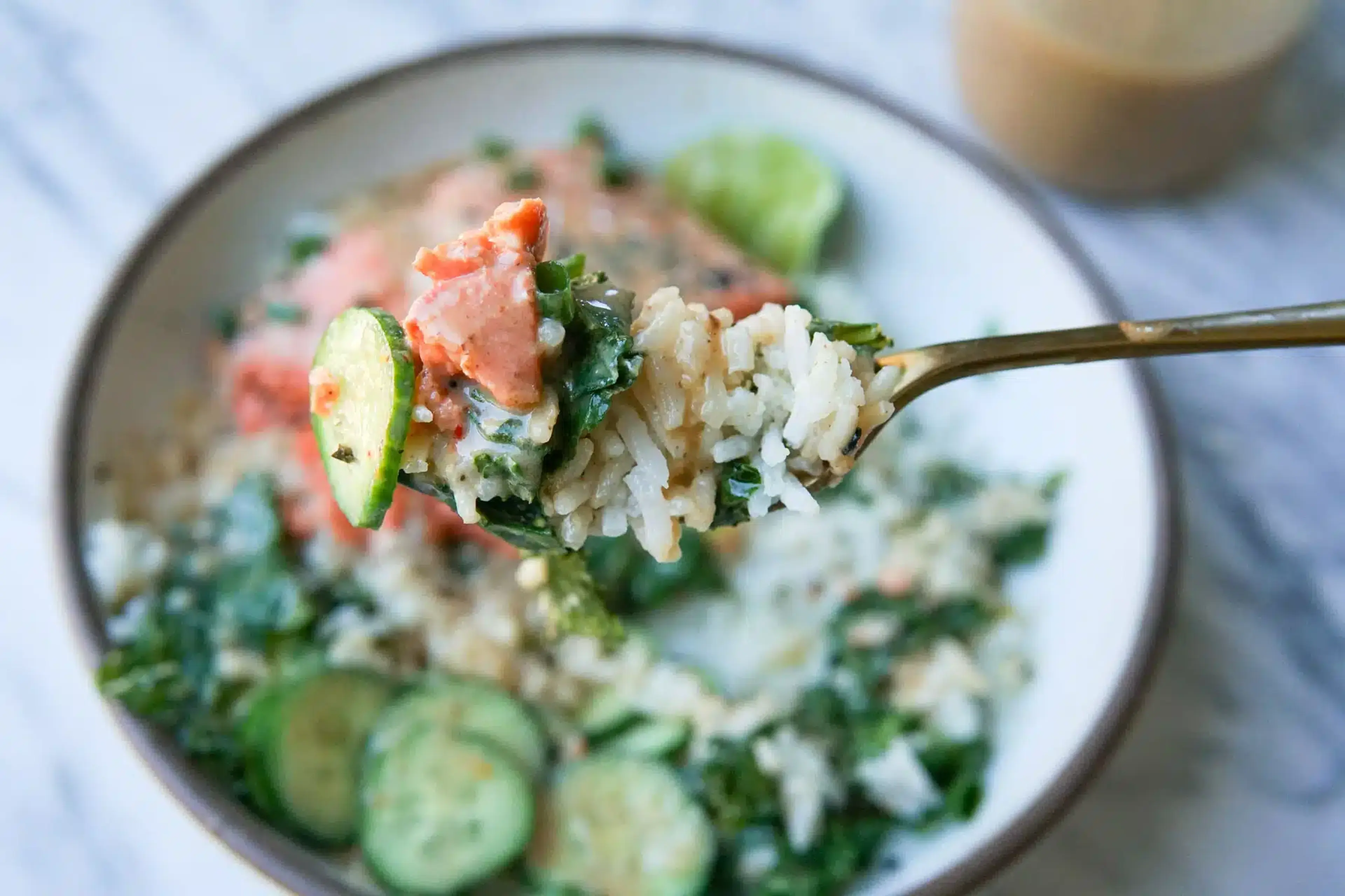 One Pot Salmon + Coconut Rice with Coconut Tahini Sauce
