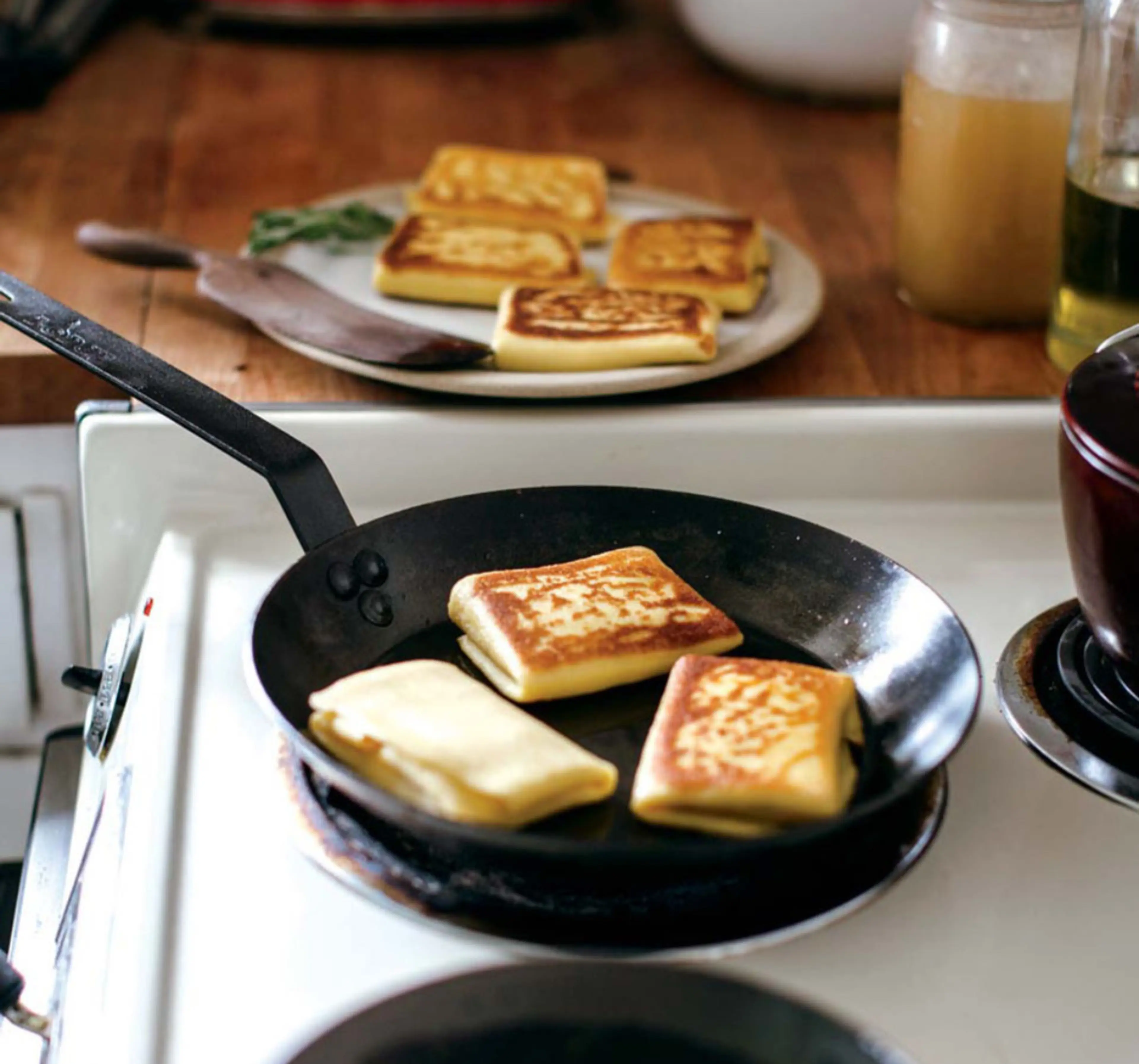Honey Ricotta Blintzes with Caramelized Onions