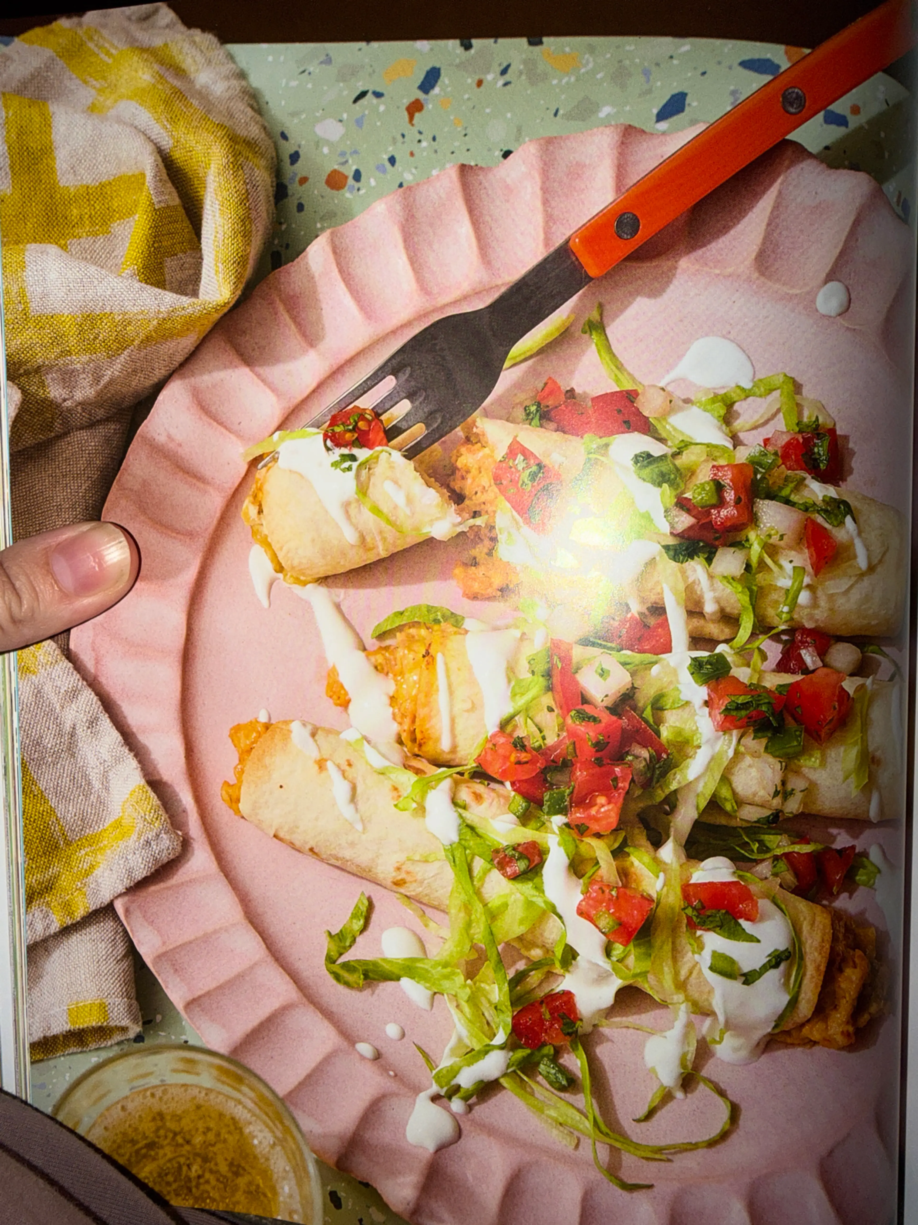 white cheddar chili crisp flautas WITH LIME CREMA