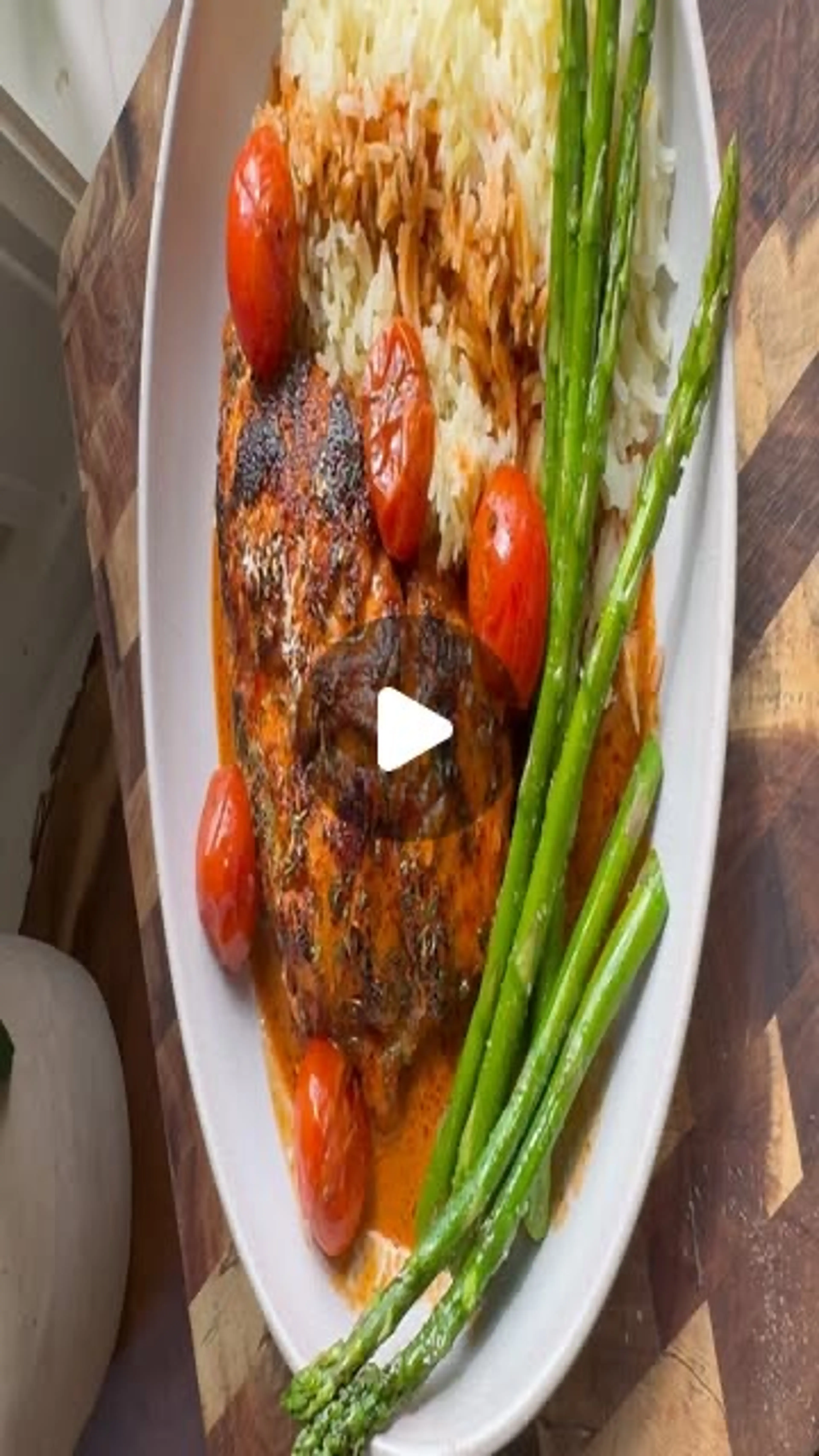 Chicken in a Tomato Cream Sauce Over Rice