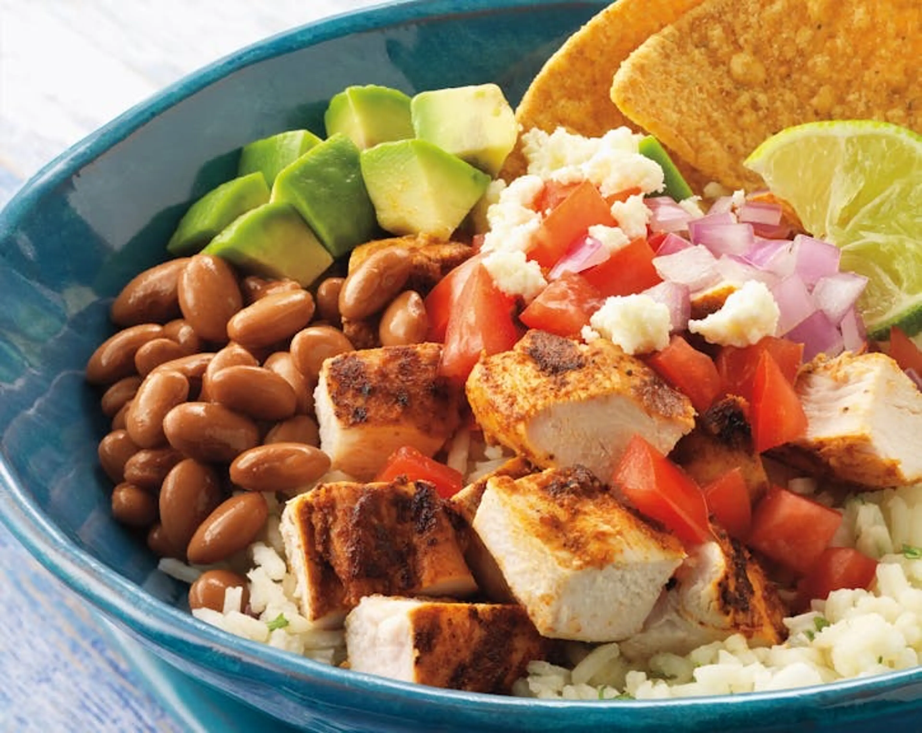Mexican Chicken Bowls with Rice, Beans, and Queso Fresco