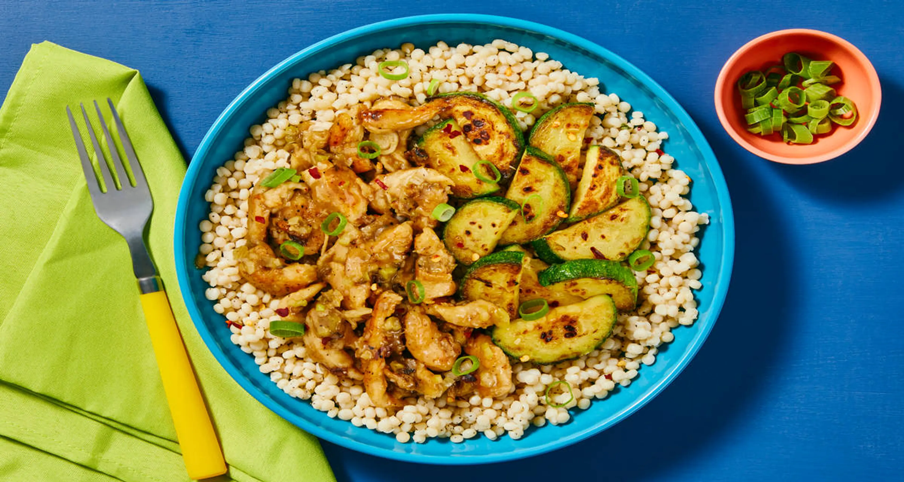 Hot Honey Glazed Garlic Chicken with Couscous & Zucchini