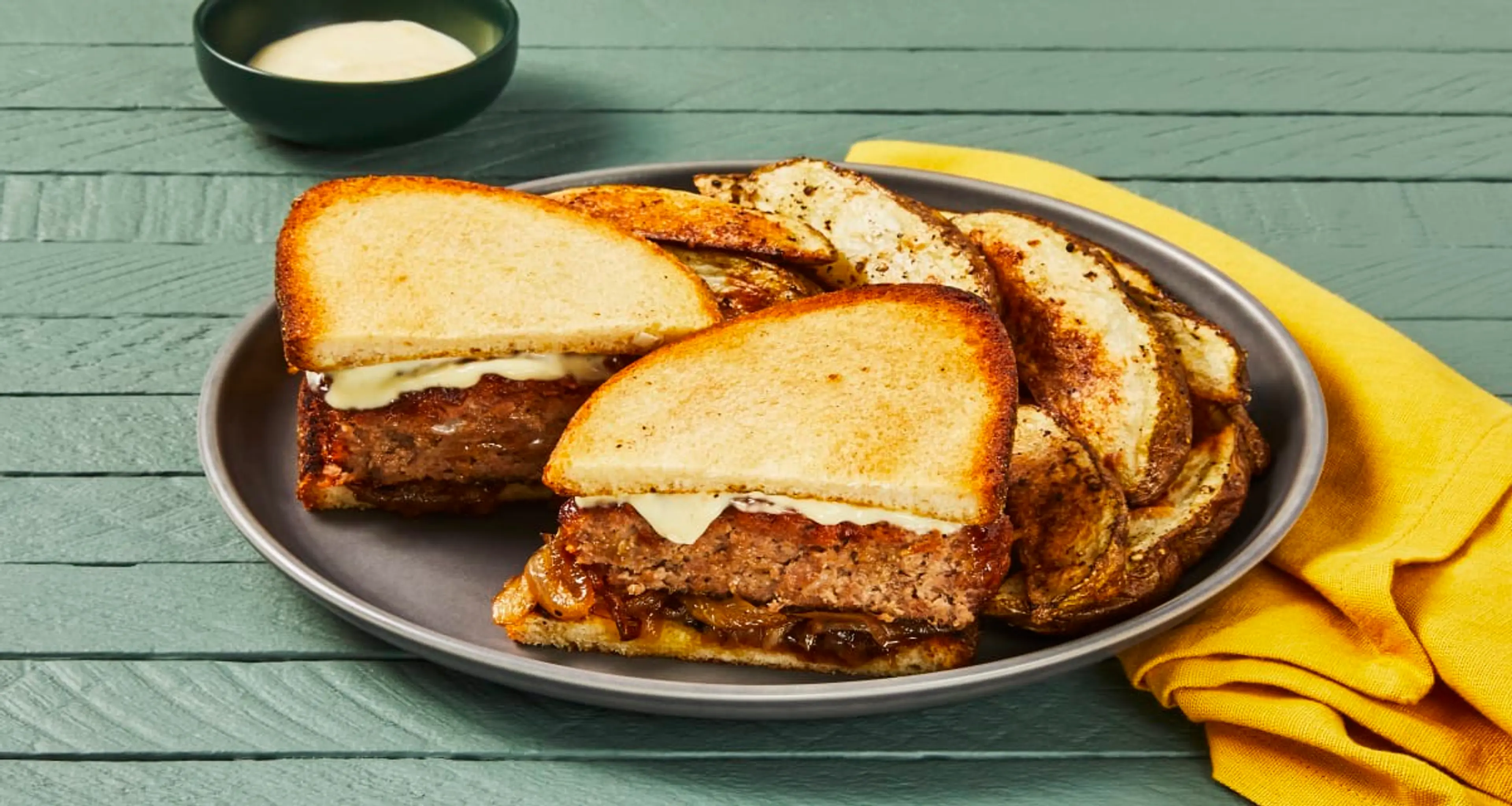 Caramelized Onion Meatloaf Sandwiches with Potato Wedges & H