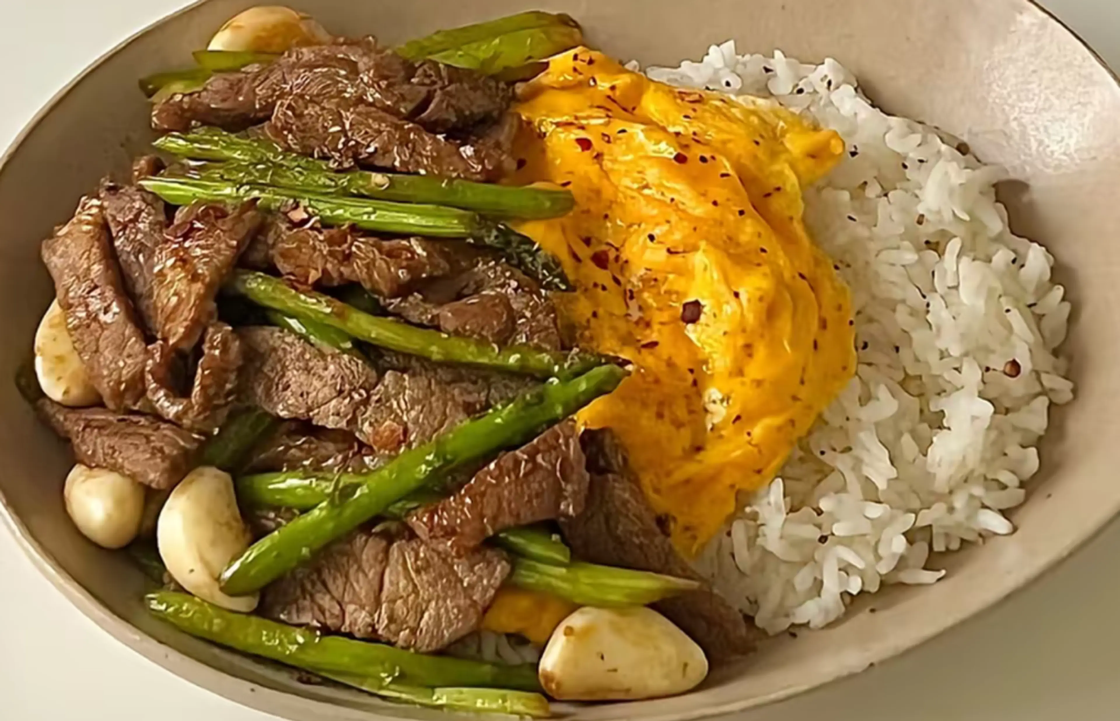 Asparagus beef scrambled egg rice bowl