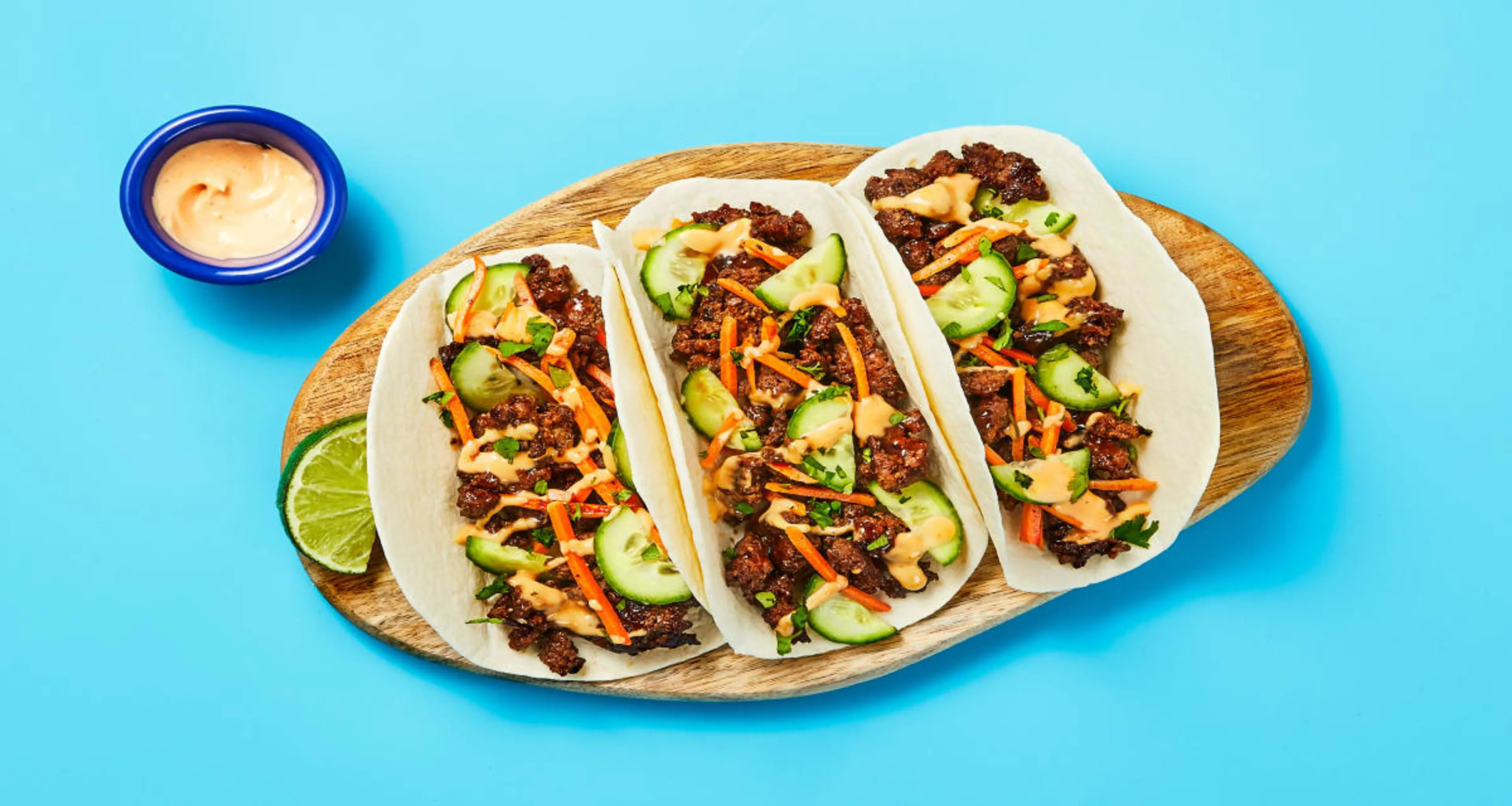Banh-Mi-Style Beef Tacos with Pickled Cucumber & Sriracha Ma