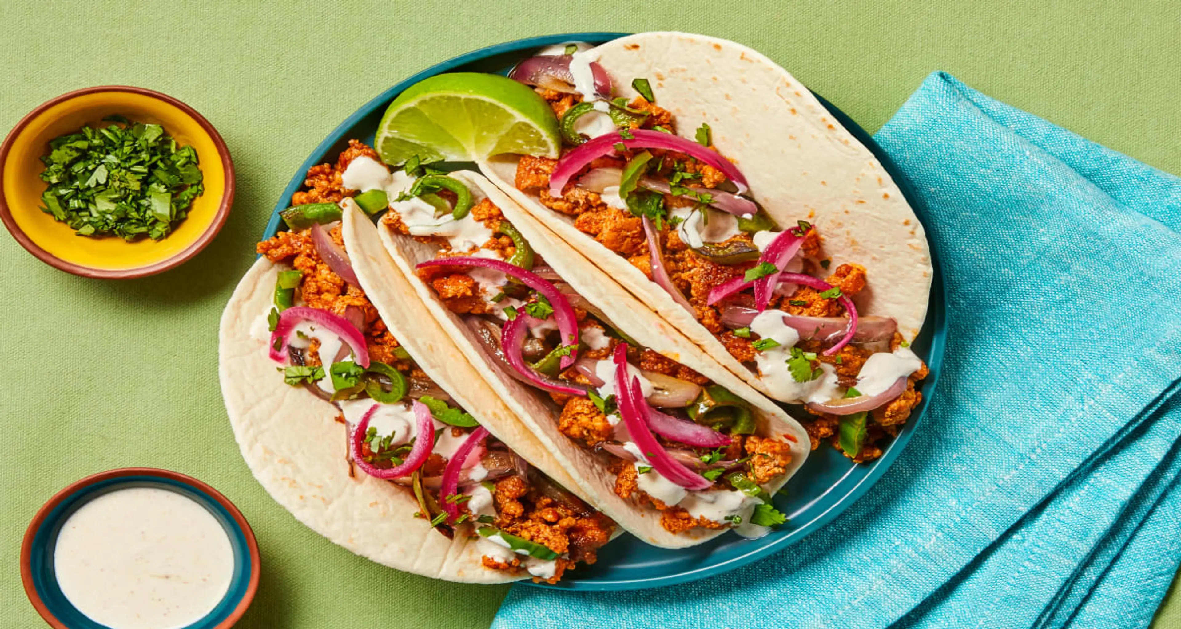 Citrus Pork Tacos with Pickled Onion & Southwest Crema