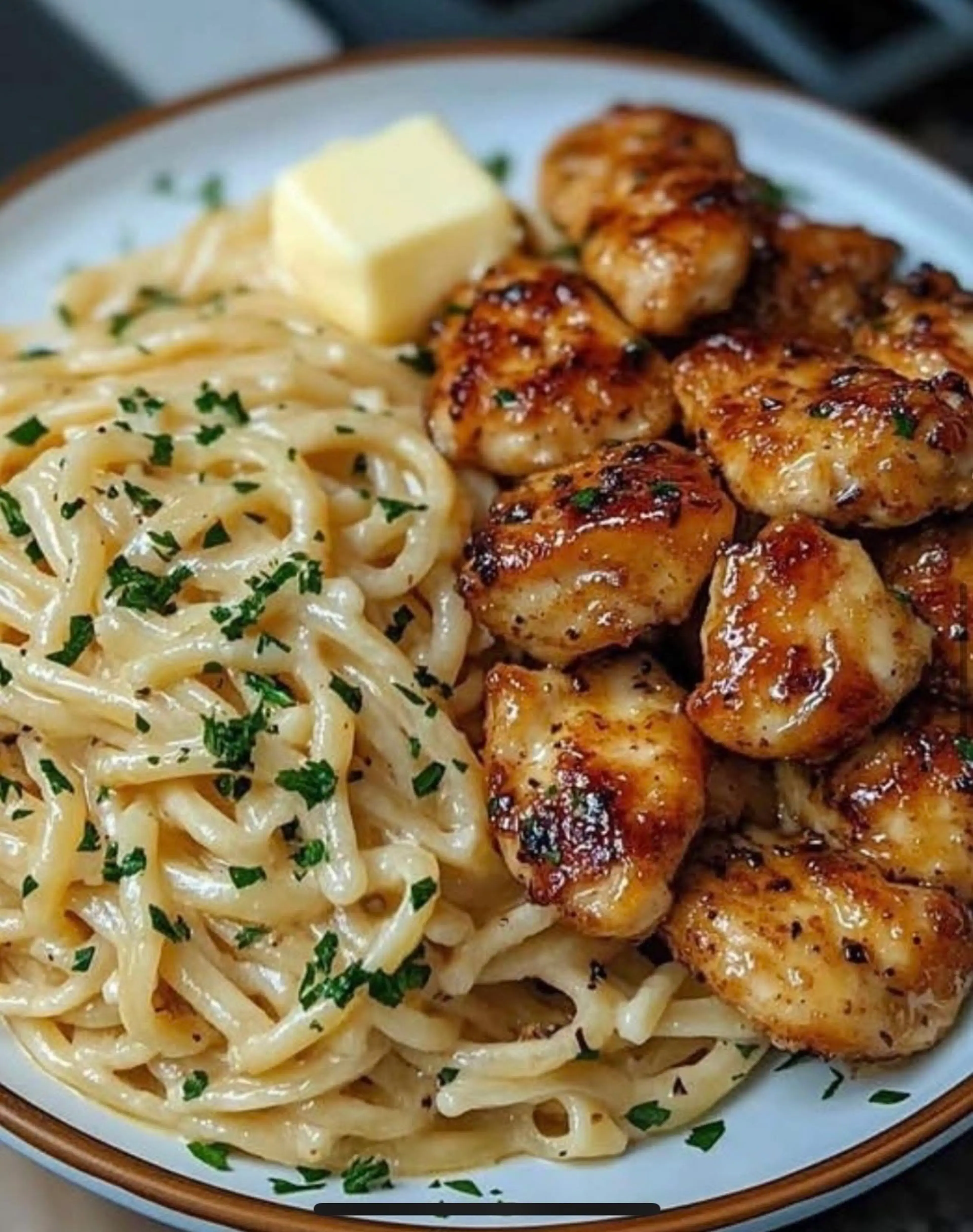Lemon garlic butter chicken served with creamy parmesan ling