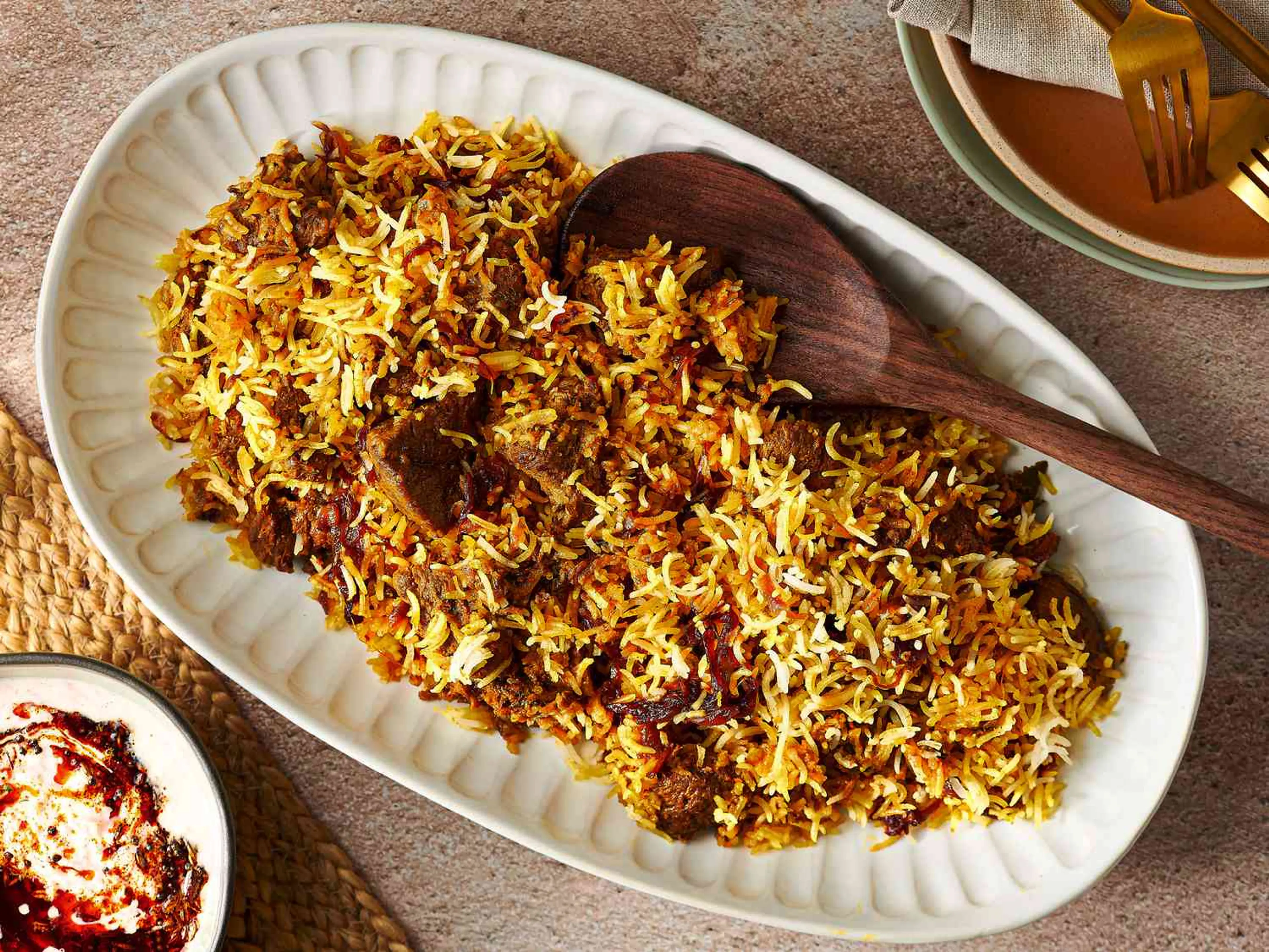 Lamb Biryani With Saffron, Yogurt, and Caramelized Onions